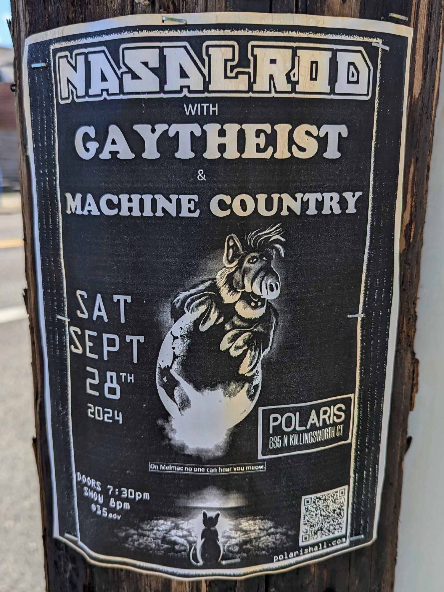 A flyer stapled to a utility pole advertising "Nasalrod with Gaytheist & Machine Country" on Saturday, September 28th 2024 at Polaris at 635 N. Killingsworth Ct. in Portland, Oregon. The flyer includes a picture of Alf emerging from behind an egg from the movie "Alien" while being watched by a cat with its back to the viewer.  There is also text that reads "On Melmac no one can hear you meow."