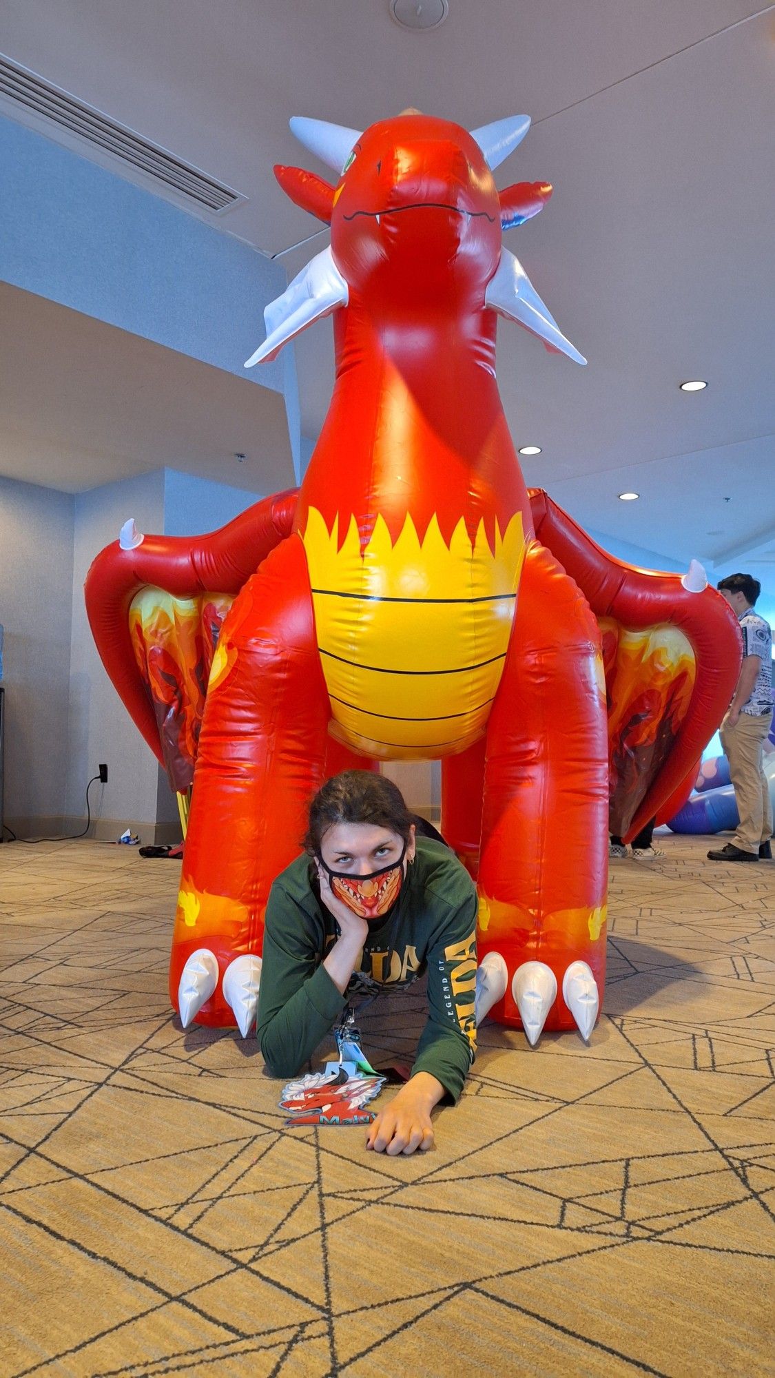 Human Sero under an inflatable dragon