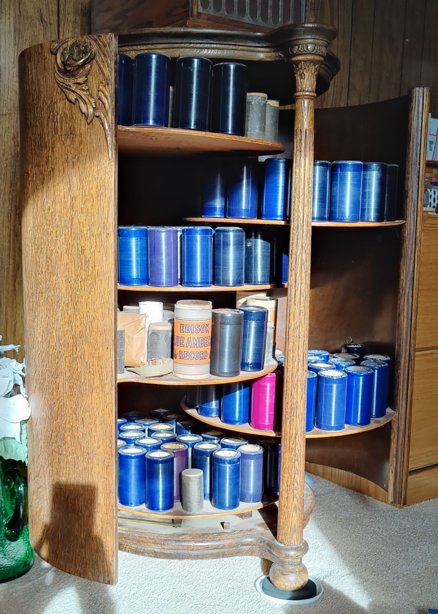 custom cabinet with wax cylinders