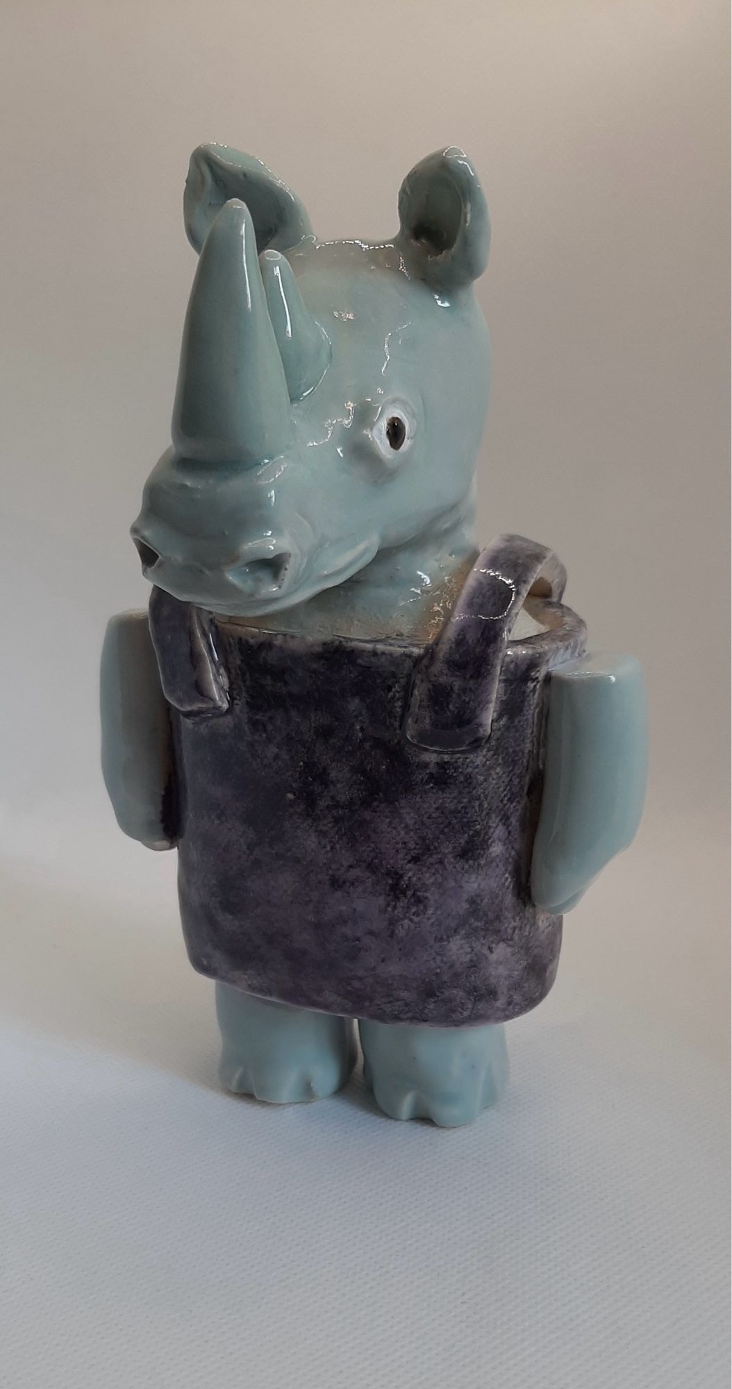 Photo of a ceramic figurine of a rhino