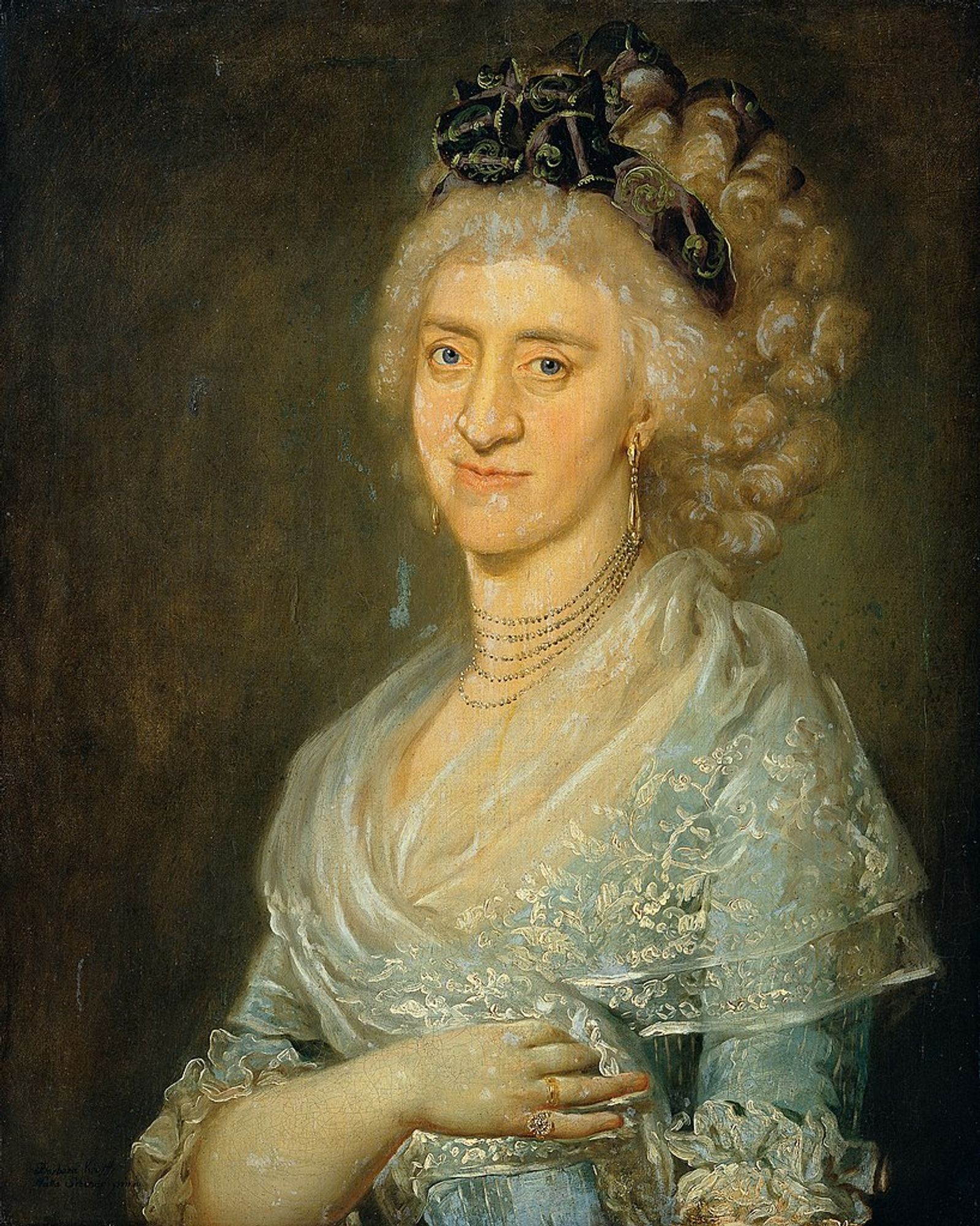 A depiction of a half-length portrait in oil of a woman with curly powdered hair, wearing a pale blue dress and a lacy white shawl.