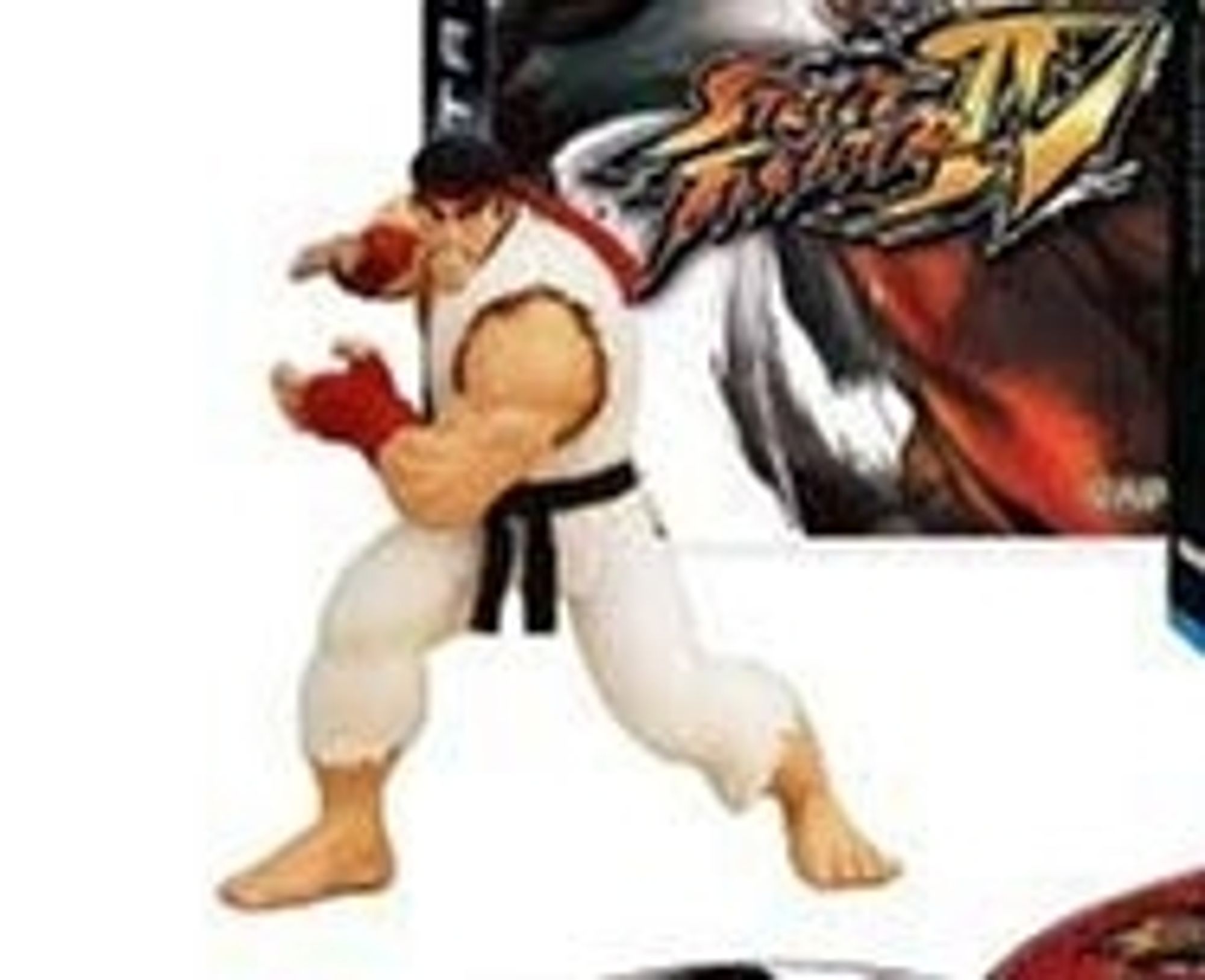 Ryu figurine that came with Street Fighter IV special edition. His hands make the shape as if he will Hadouken however it looks like he's playing defense with a basketball in real life.