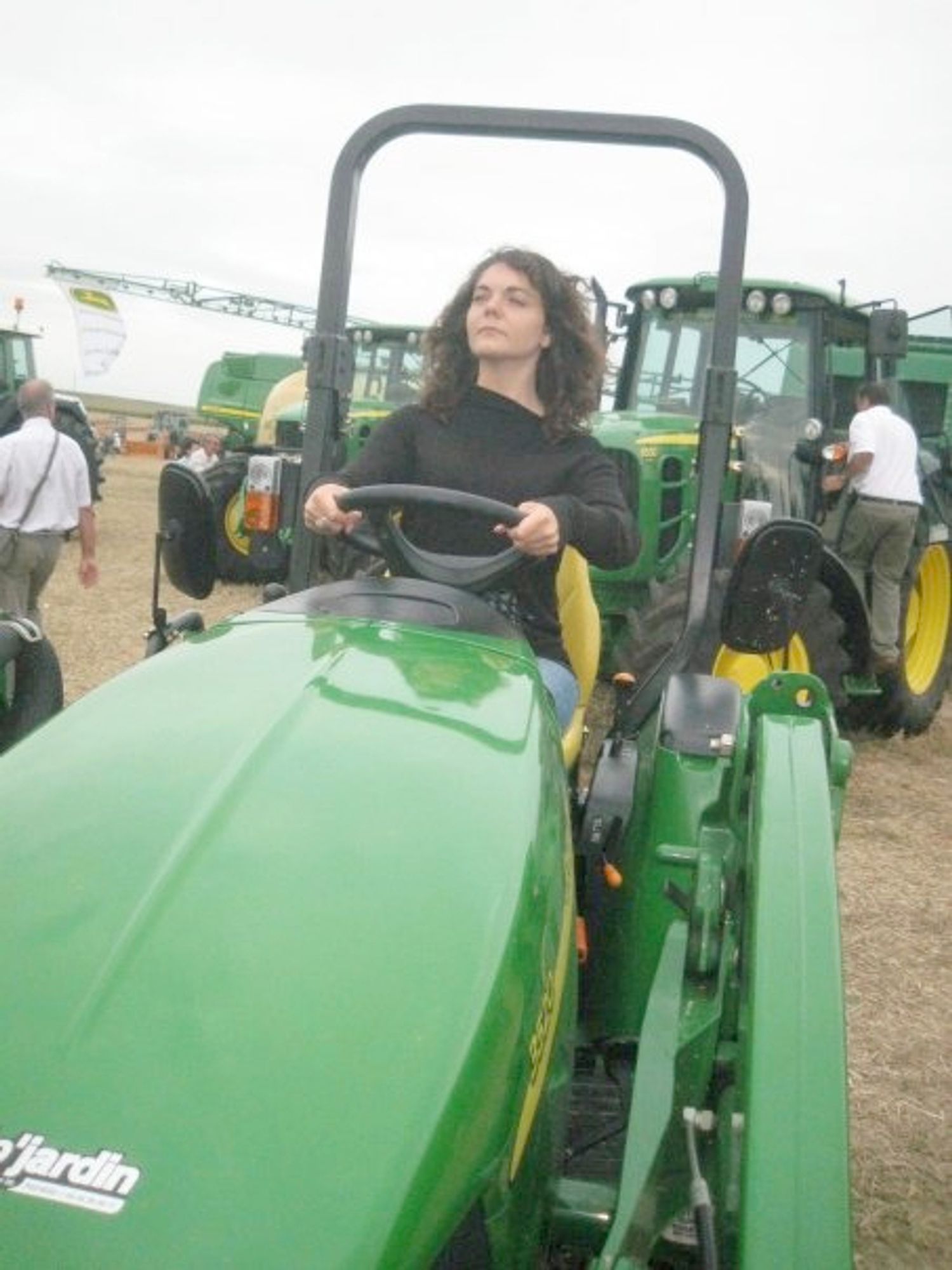 A french radical driving a tractor