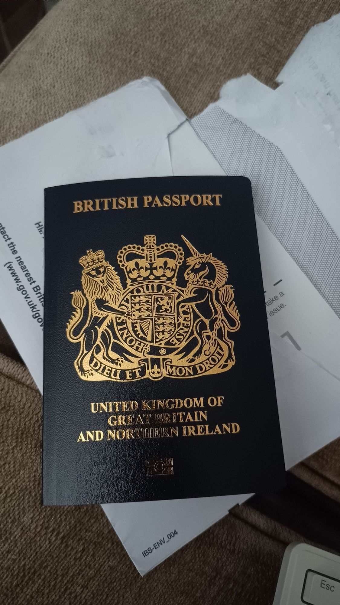 Disgusting & hideous "British" passport. filthy & discoloured.