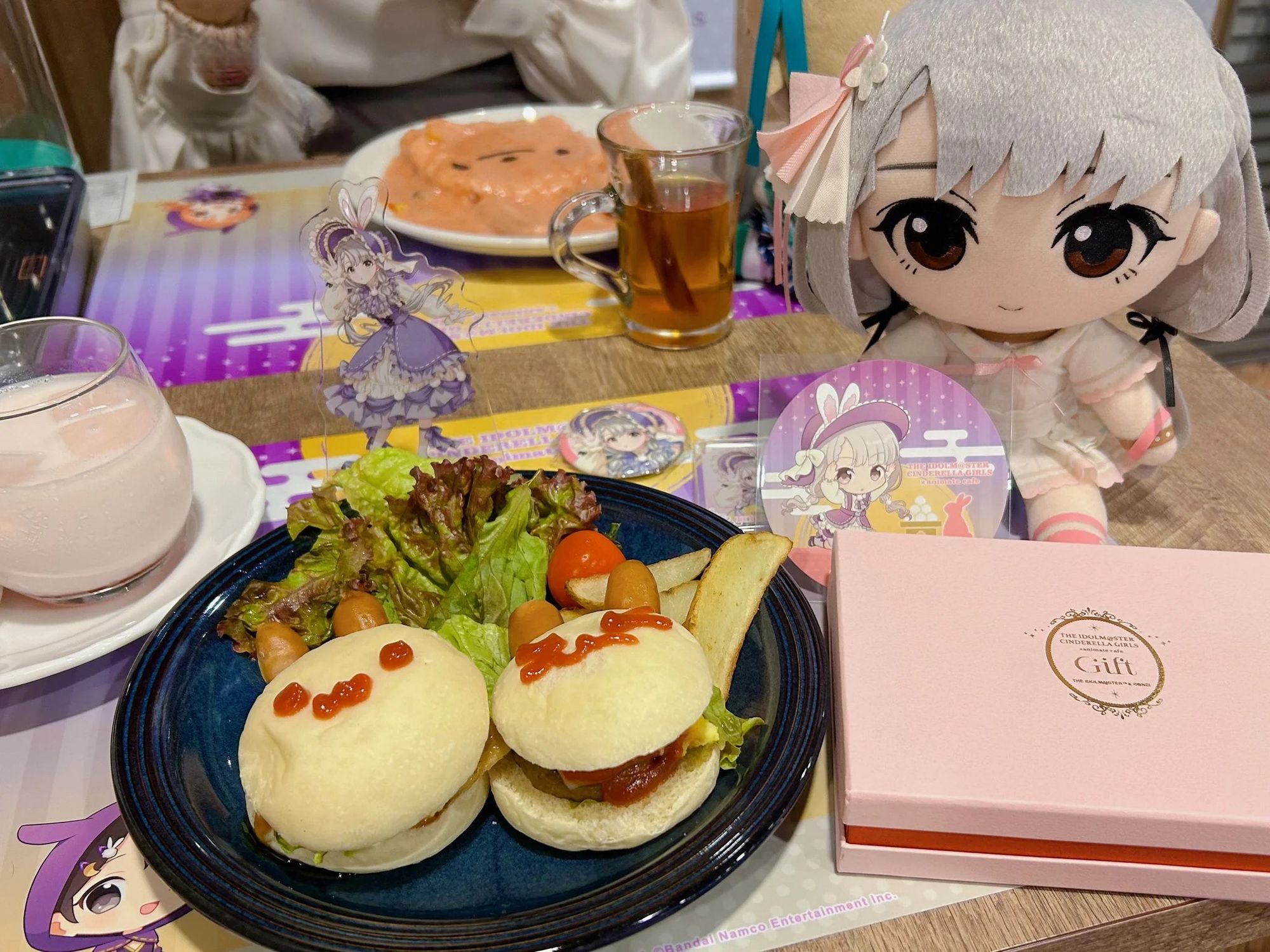 Displaying the food served there with a Hisakawa Nagi  plush.