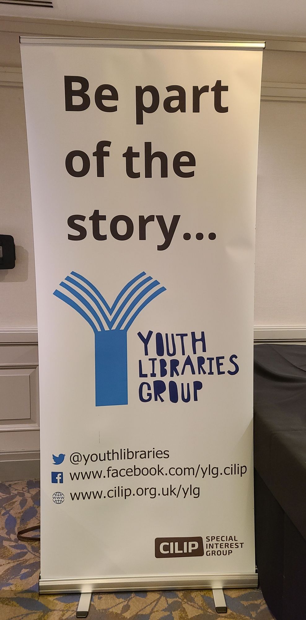 Banner that says: Be part of the story...
Youth Libraries Group (logo)
X: @youthlibraries
Facebook: www.facebook.com/ylg.cilip
Web: www.cilip.org.uk/ylg
CILIP Special Interest Group