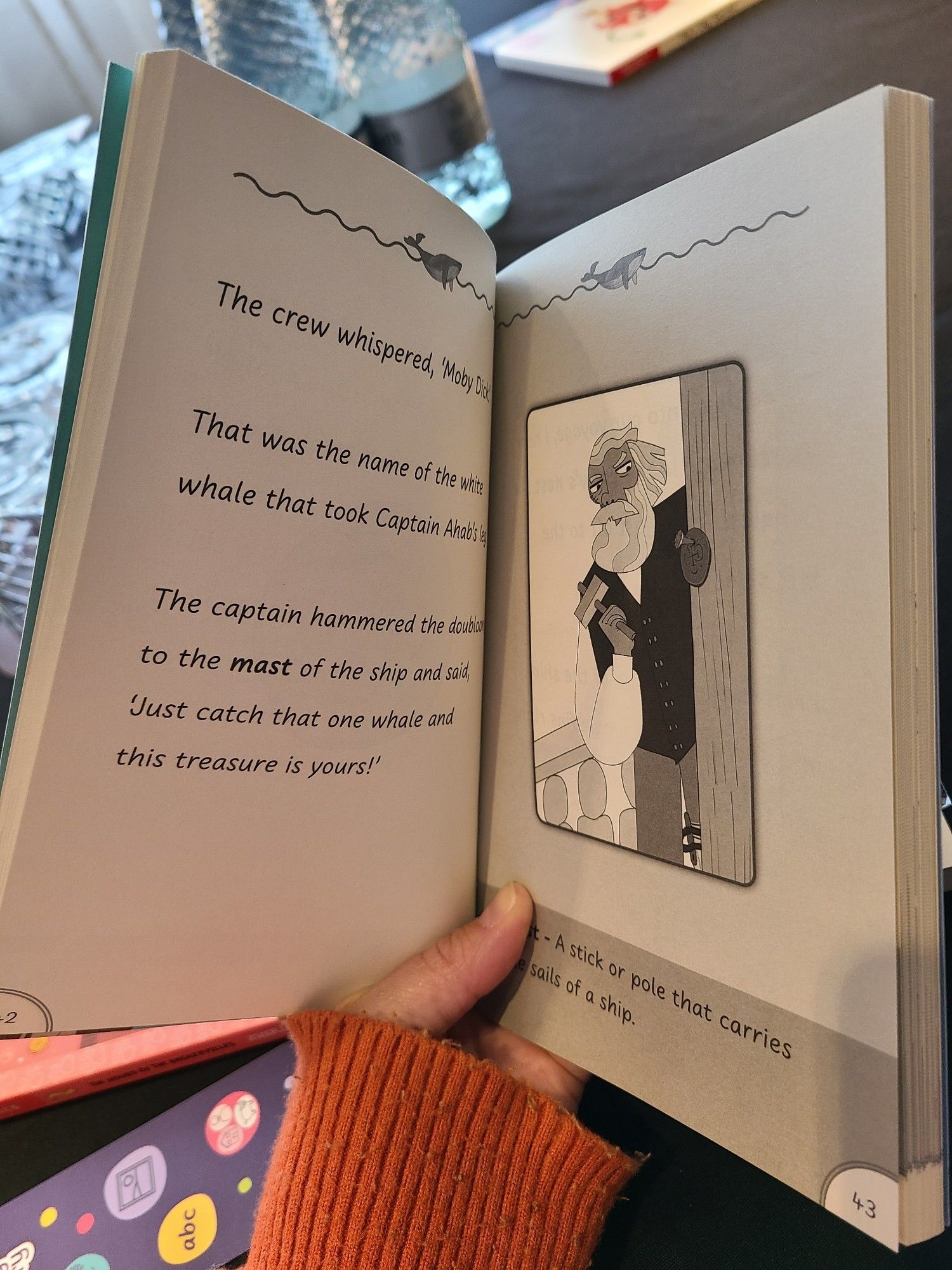 Pg 42 in the Easier Classics edition of Moby Dick. Shows brief text on the left and an illustration on the right, with a glossary term. Same part of the story as pg42 in the Symbolised Classics.