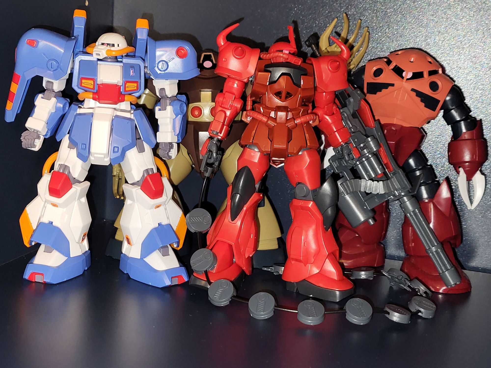 From left to right: Hobby Hizack HG, Gogg HG, Red Gouf Custom HG, ZGok HG