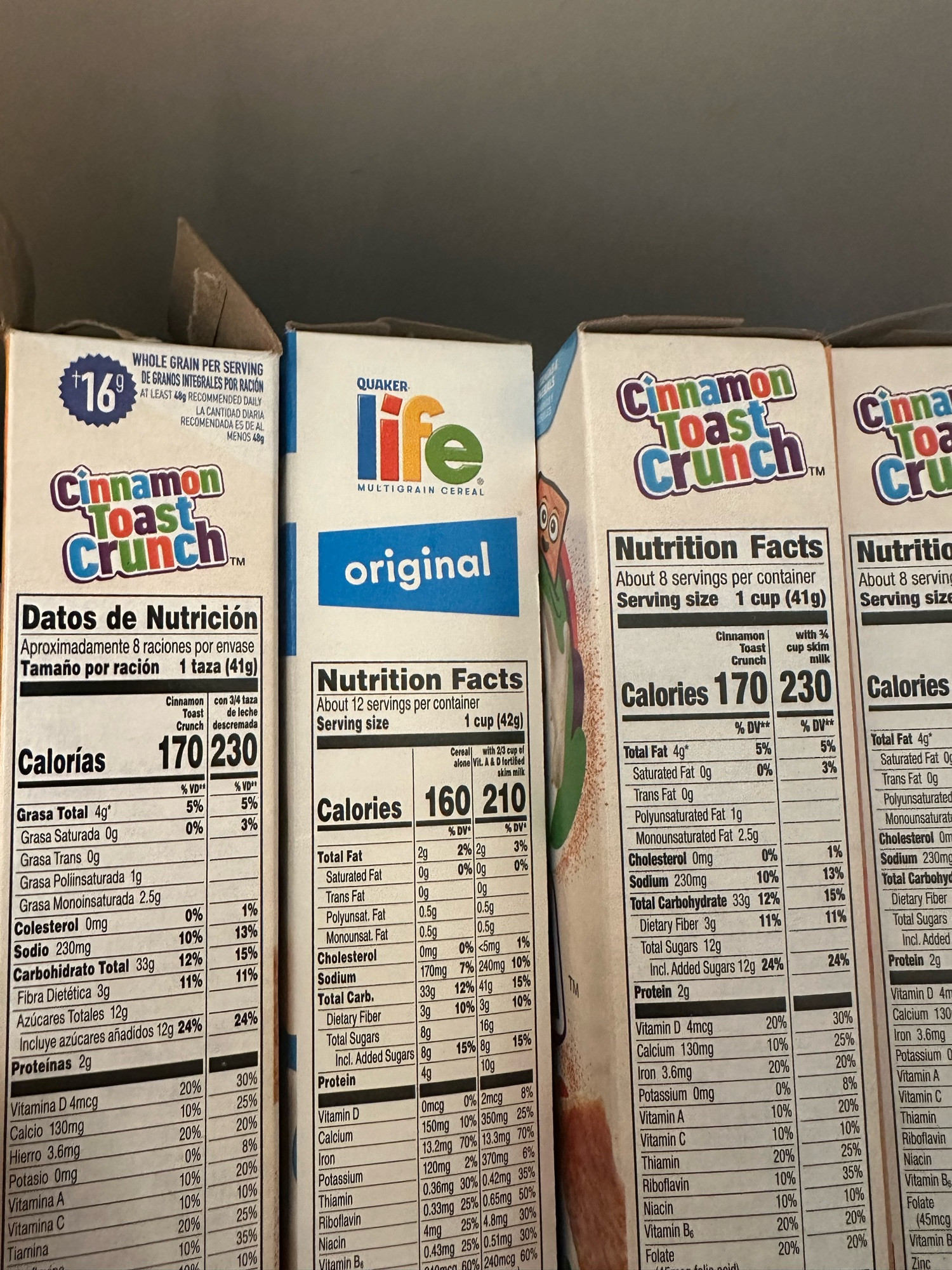 three boxes of cereal with a box of life mixed in