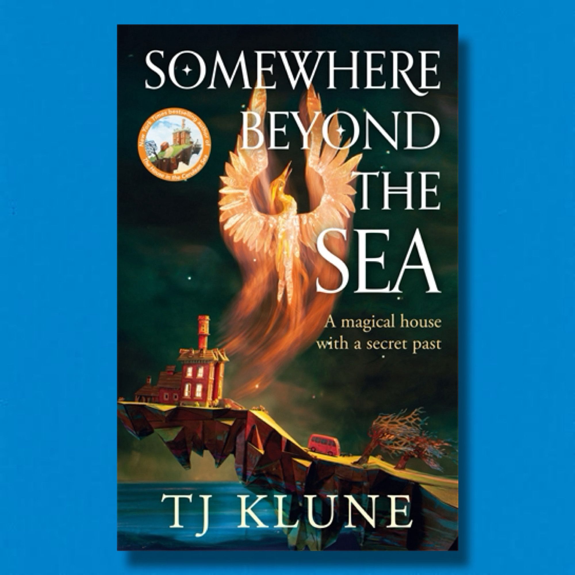 Book cover of Somewhere Beyond the Sea by TJ Klune with a cerulean background because it couldn’t have been any other colour