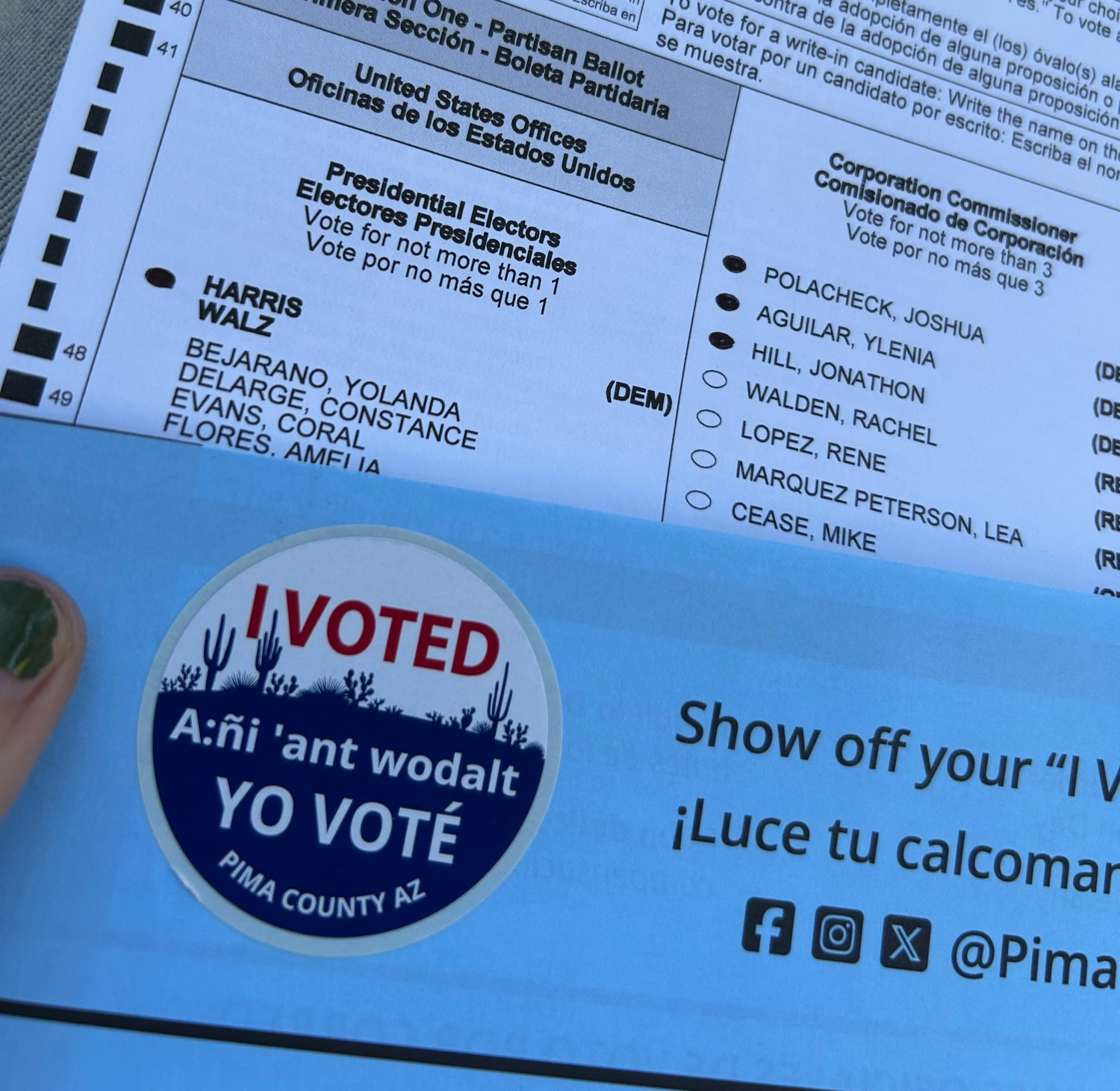 A voting affidavit and “I voted” sticker