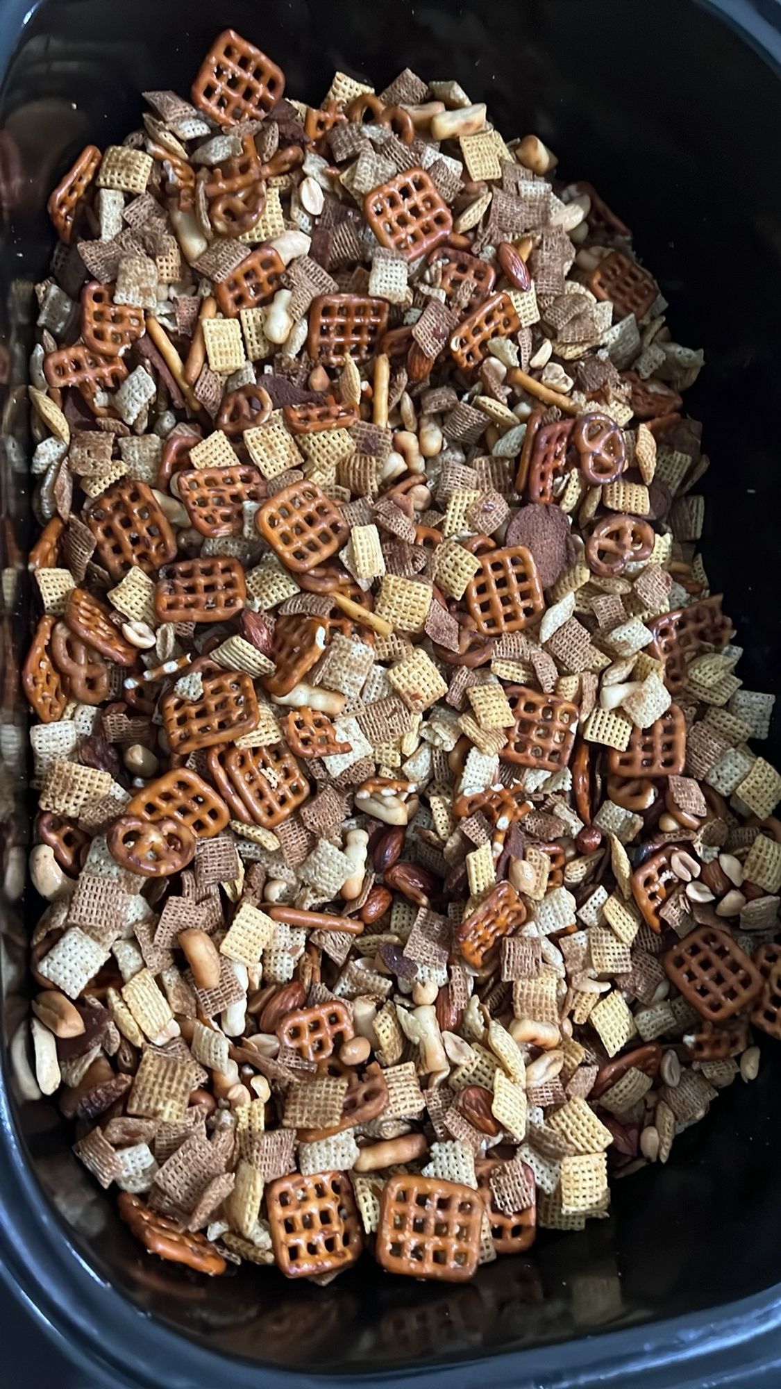 Homemade Chex mix in an electric roasting pan