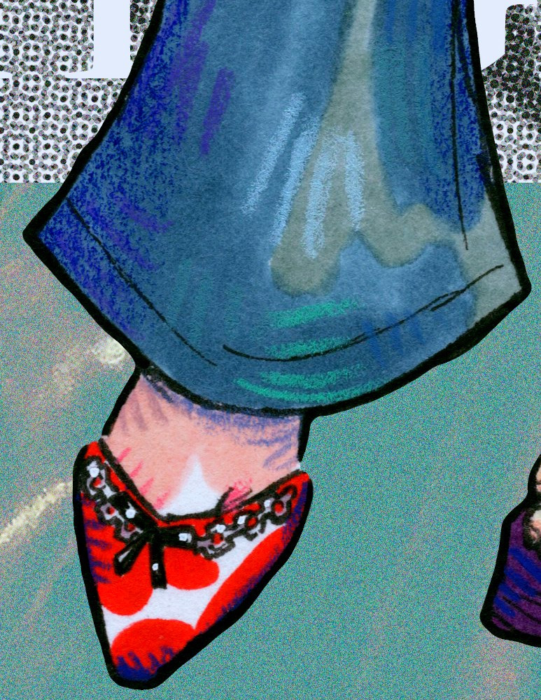 close-up of chigiri's shoe, a red pointed-toe mule with a little black bow and chain details