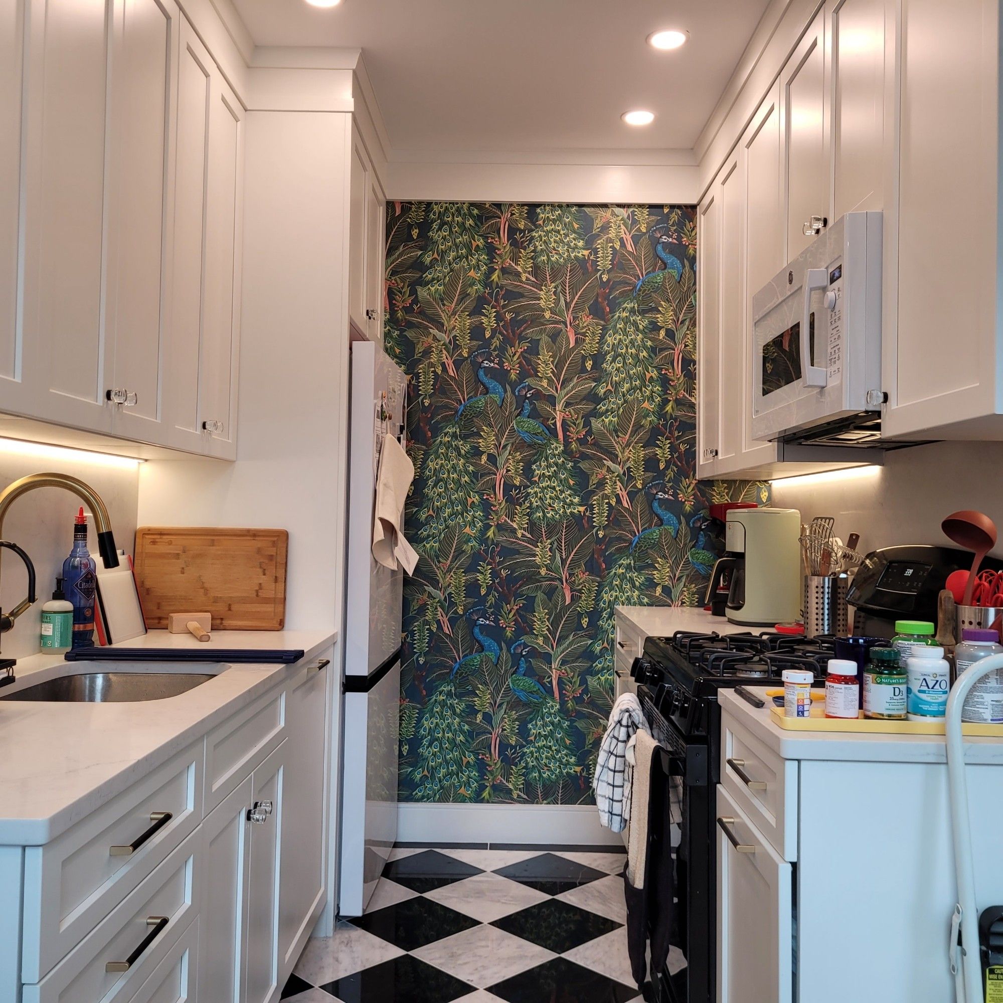 kitchen wall with peacock wallpaper