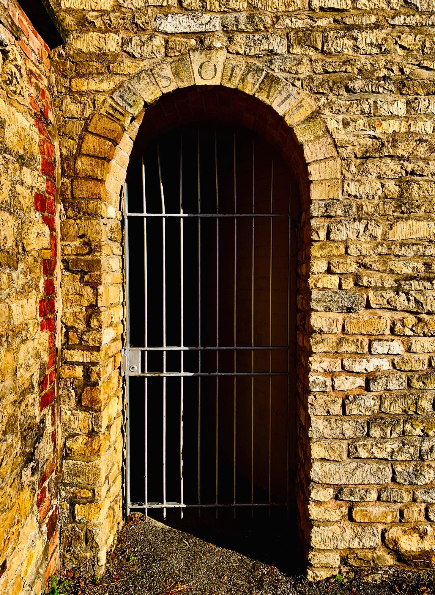 Gated entrance to the former Scotgate Coaching Inn, Stamford.