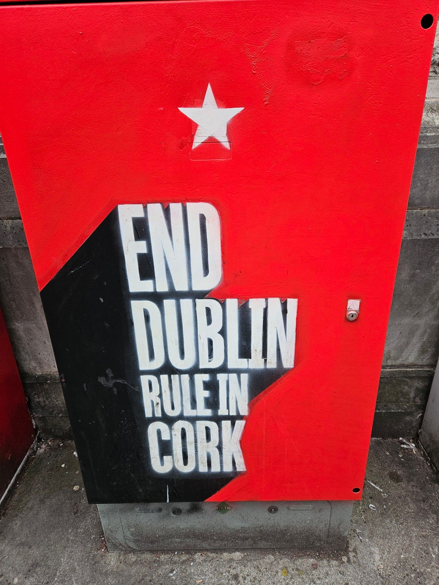 End Dublin Rule In Cork - a reference to Cork being the rebel county and considering themselves the real capital - painted on one of many roadside boxes in the city centre