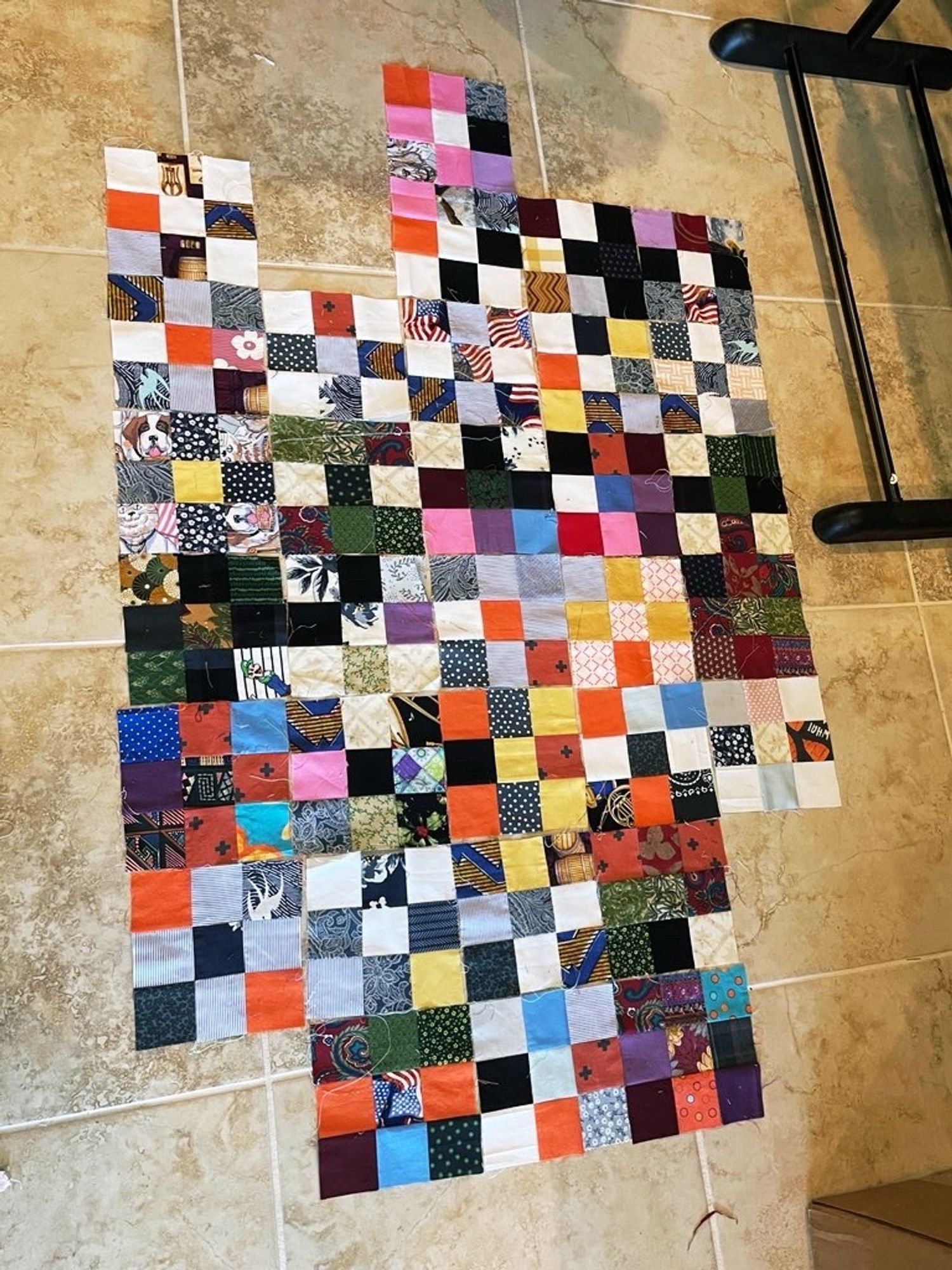 The collection of my 9 patch blocks has increased. I am showing the blocks on the floor.