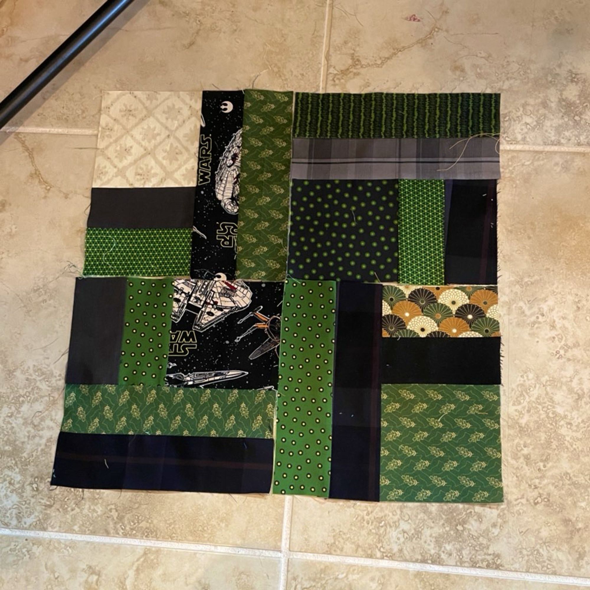 4 sample blocks for a quilt. They’re kinda green-black-tan-gold