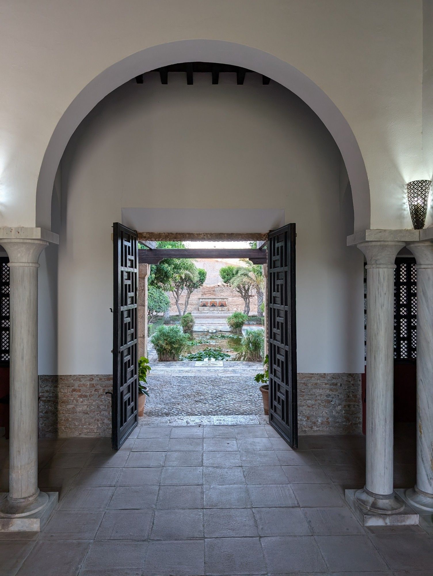 An archway and door into the inner courtyard of the Alcazaba