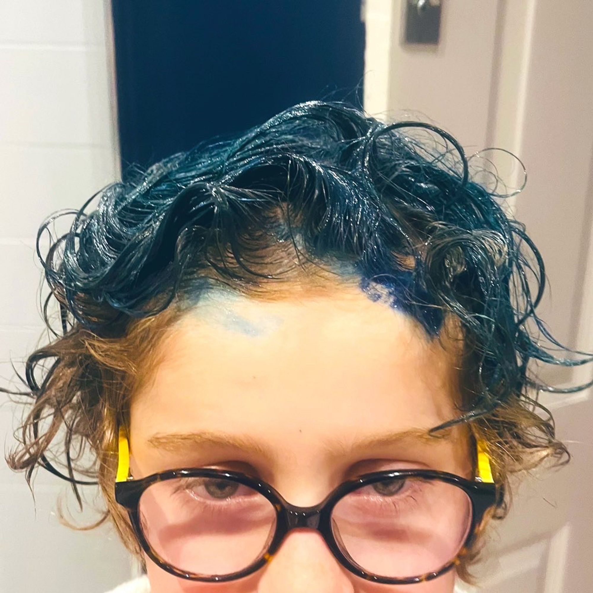 A photo of my son with dyed blue hair