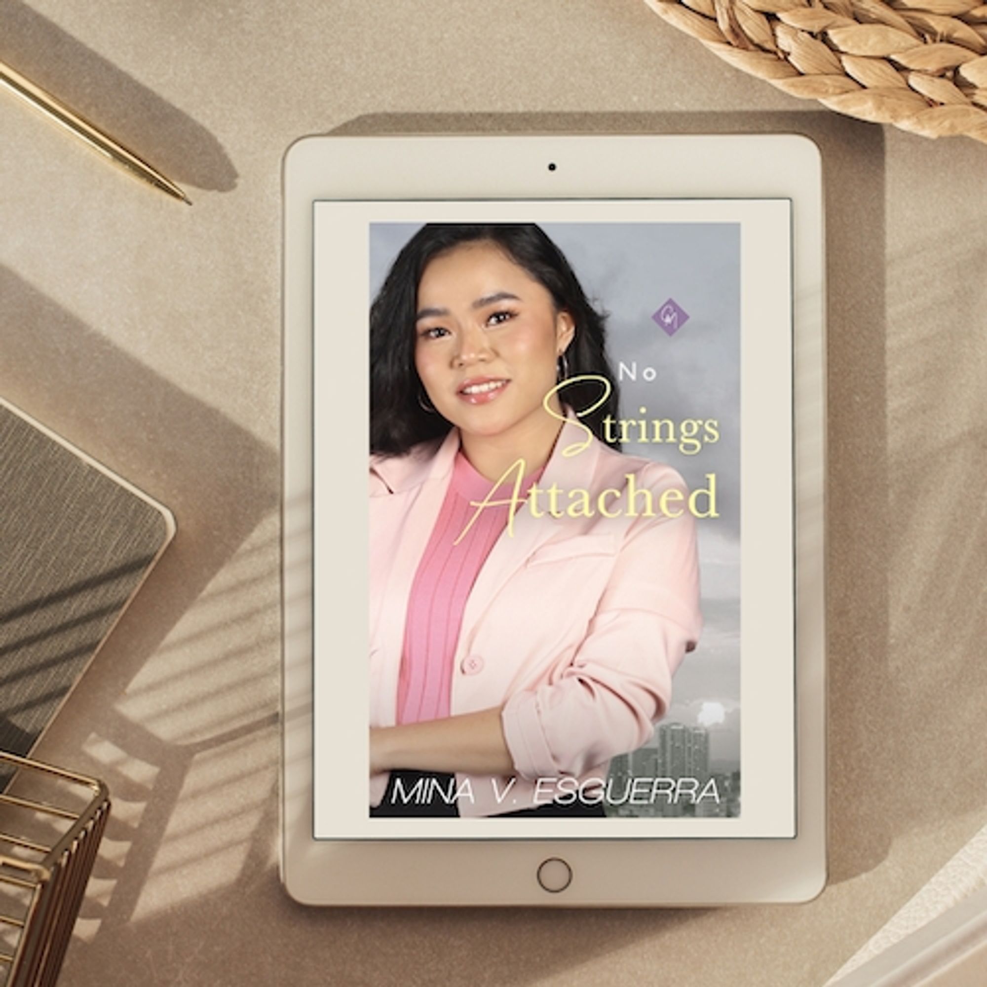 IPad displaying cover of No Strings Attached (featuring Marynor Madamesila)