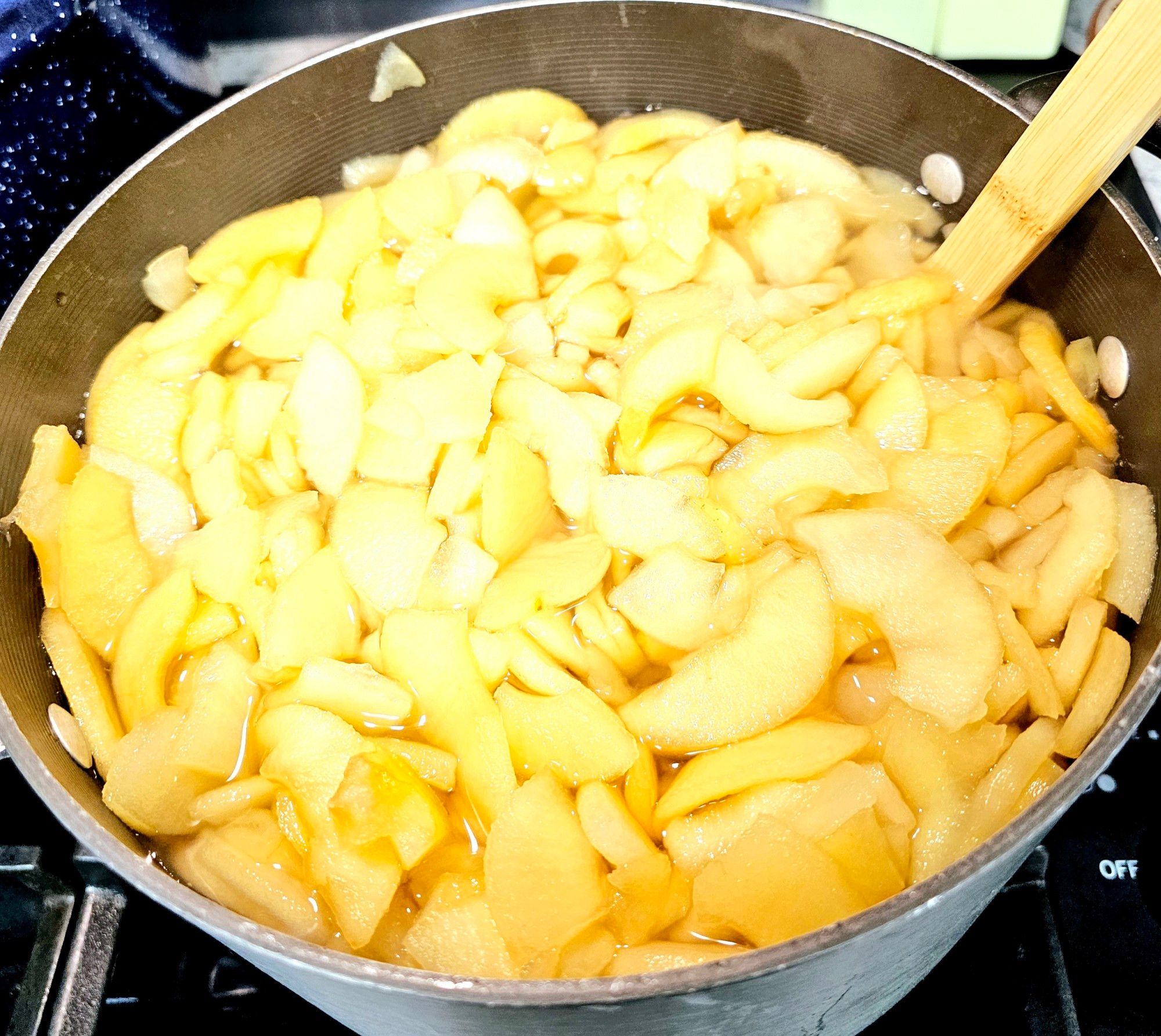 Cooking the apples down to make juice.