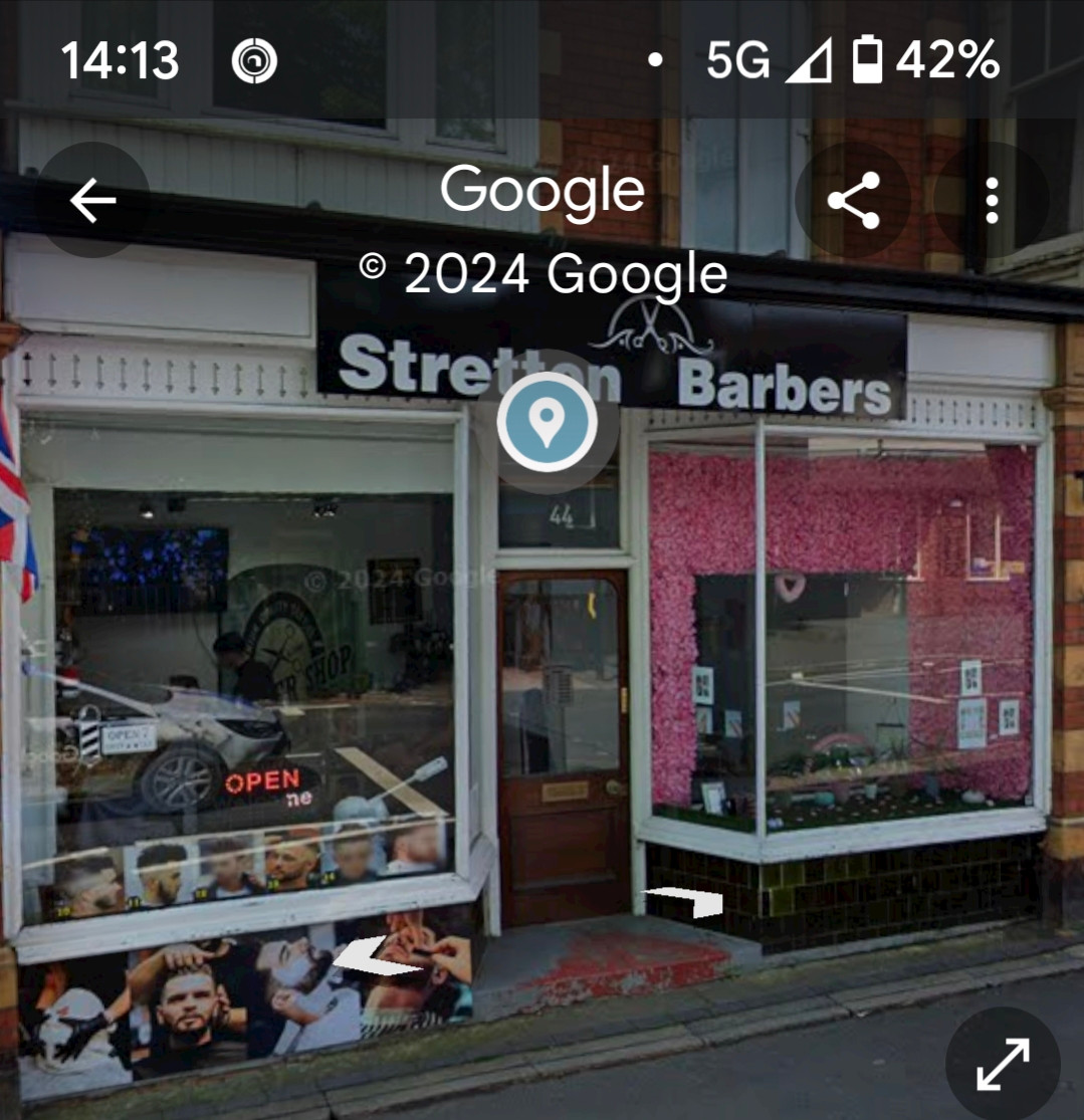 Google street view screen grab of a barbershop and nailbar in the same shop