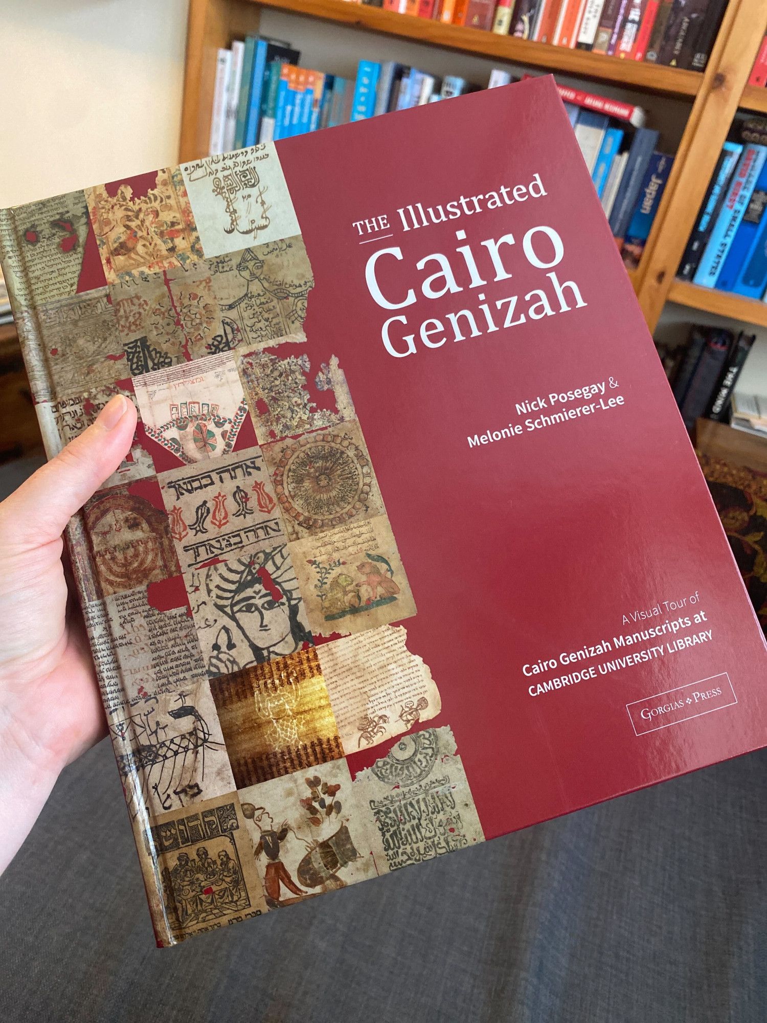 Front cover of the first copy of 'The Illustrated Cairo Genizah' by Nick Posegay & Melonie Schmierer-Lee (Gorgias Press 2024)