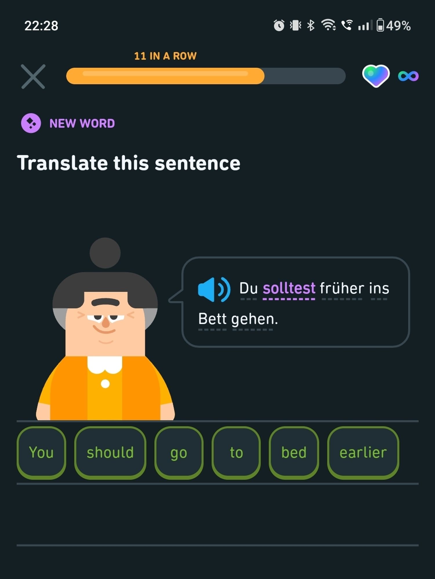 It is 10:30 pm. Duolingo presents as a German-English translation exercise a sentence meaning "you should go to bed earlier."