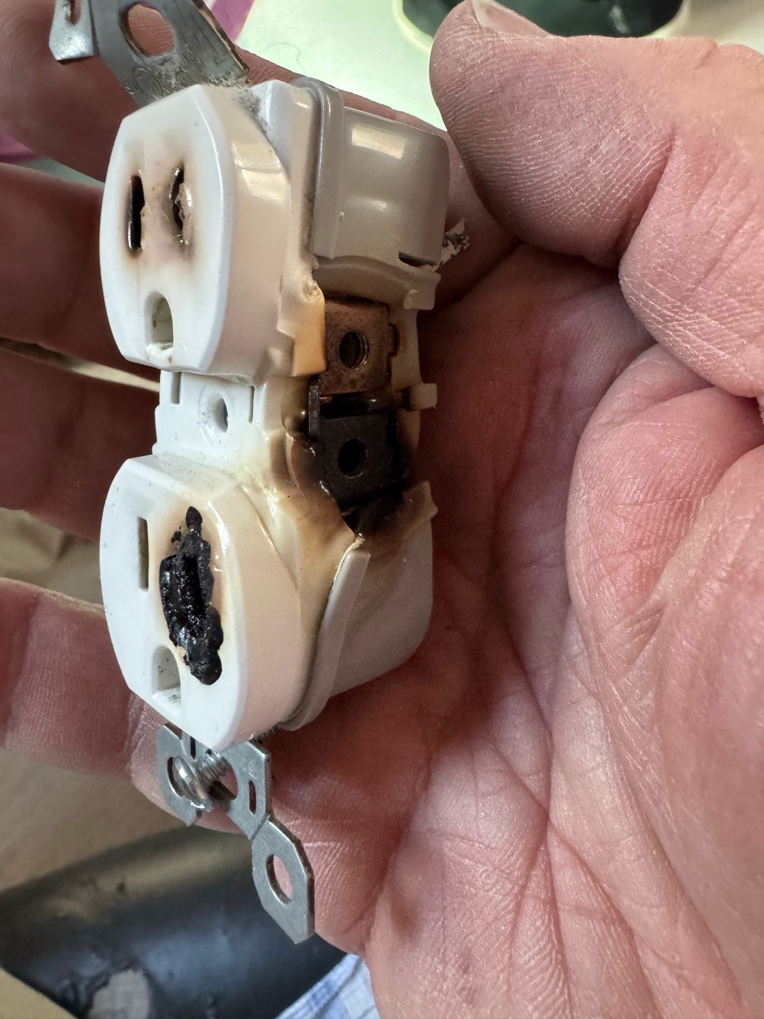 Side view of a burned out power outlet.