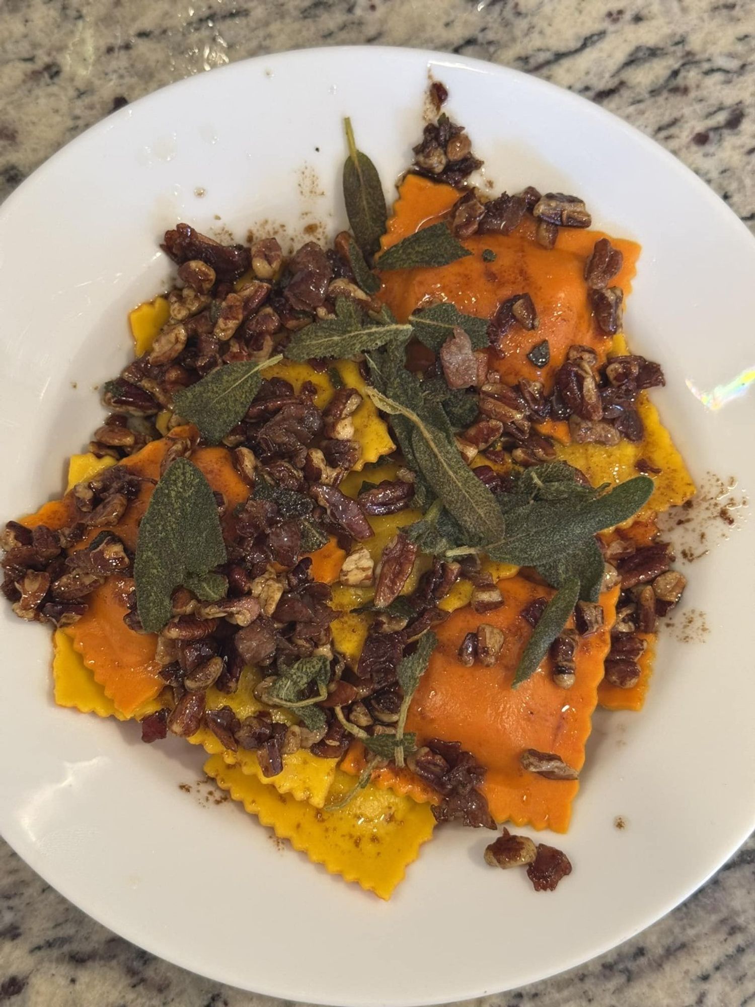 Trader Joe's honey pumpkin ravioli w brown butter, toasted pecan, balsamic, crispy sage, and pancetta