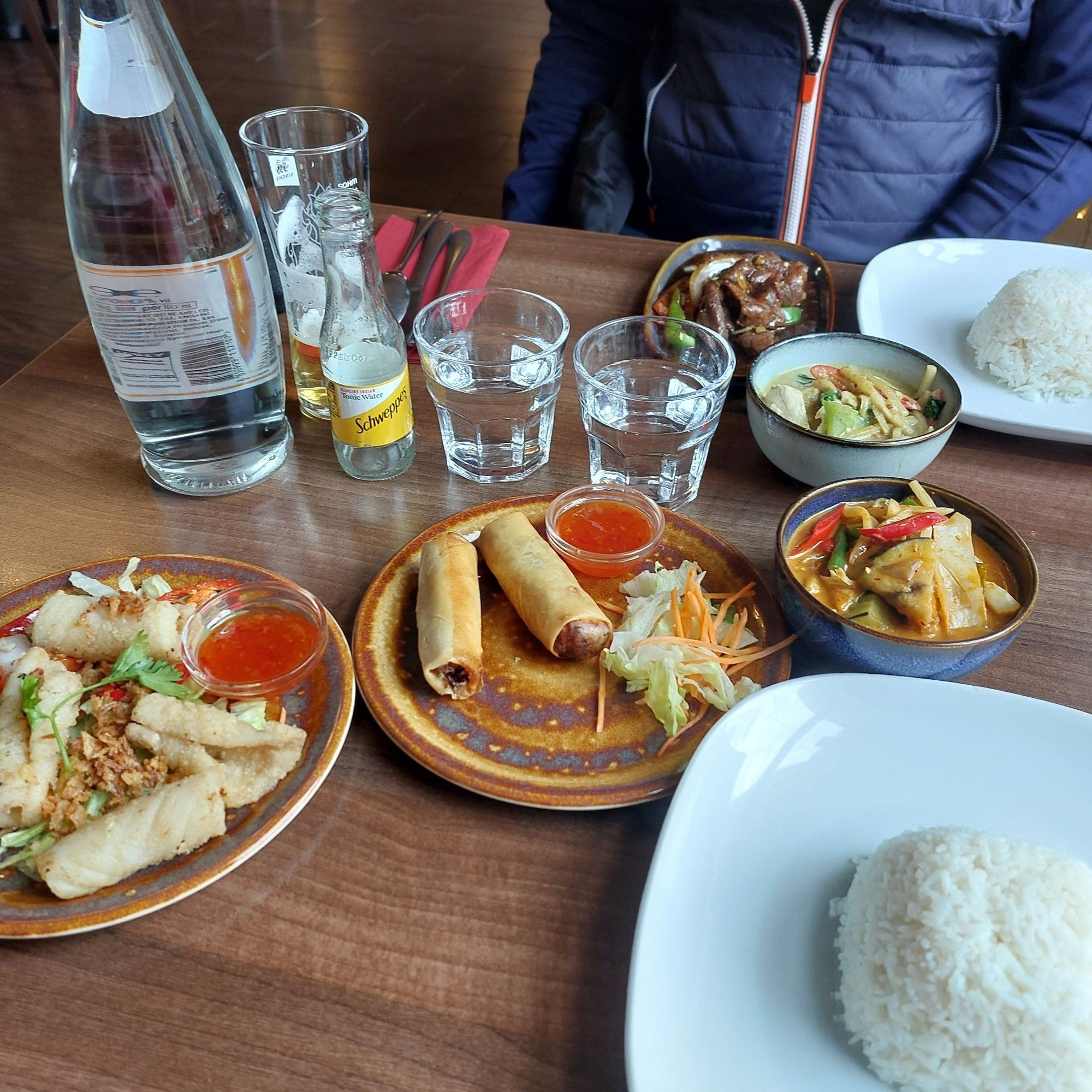 Thai food, includes Thai red curry with tofu, glass rolls and calamari