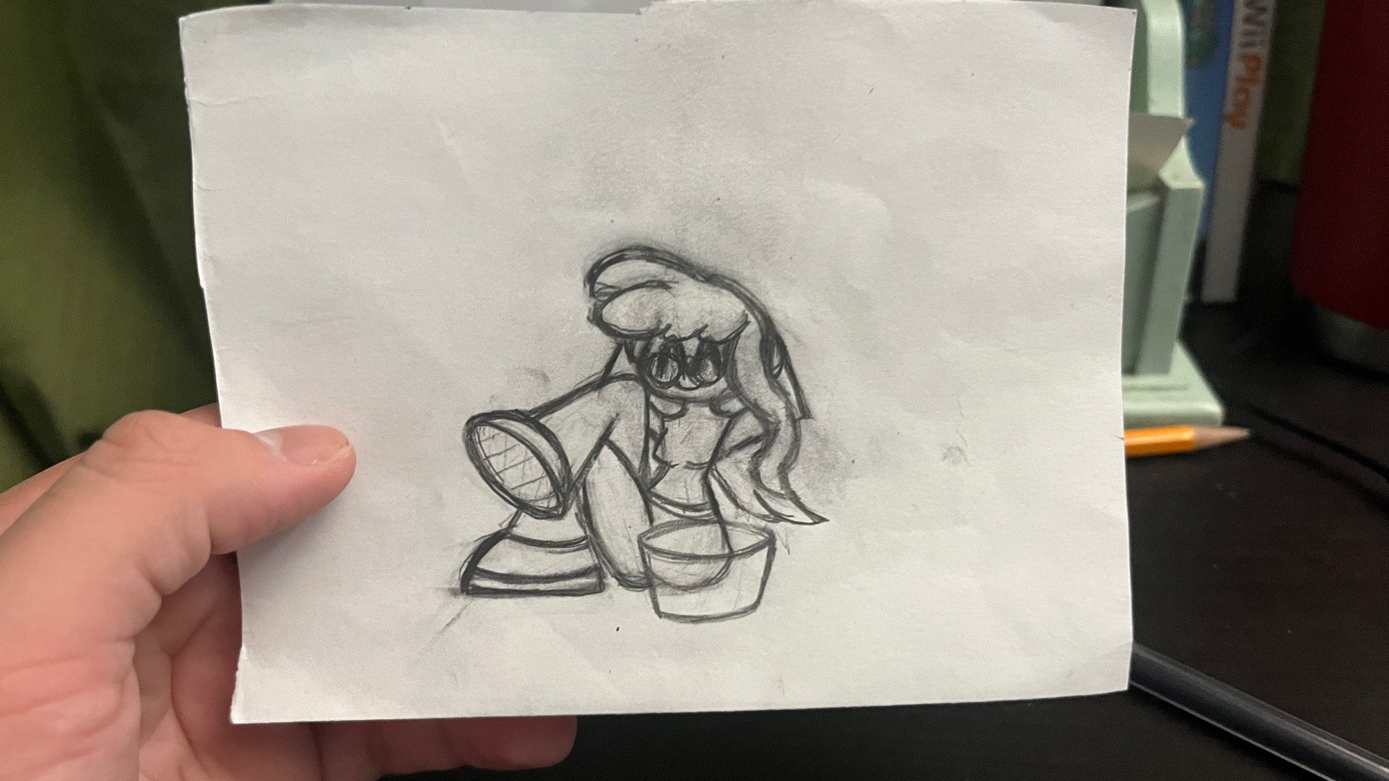 A drawing of a character with her feet over her leg.