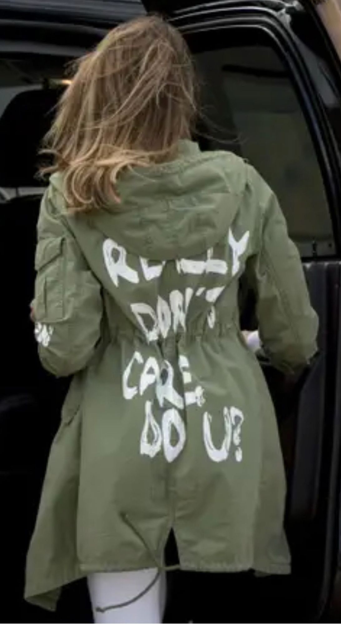 Melania Trump, showing the back her outfit declaring "[I] really don't care. Do you?"