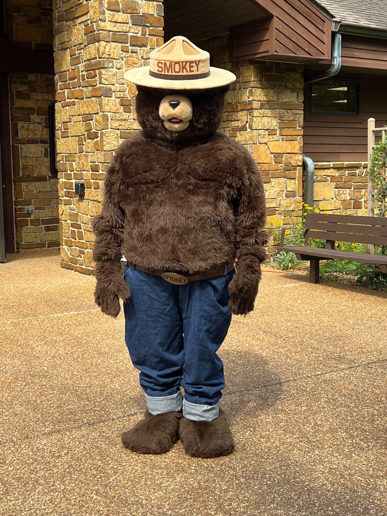 Smokey Bear standing in front of Park Visitor Center there to celebrate his 80th Birthday