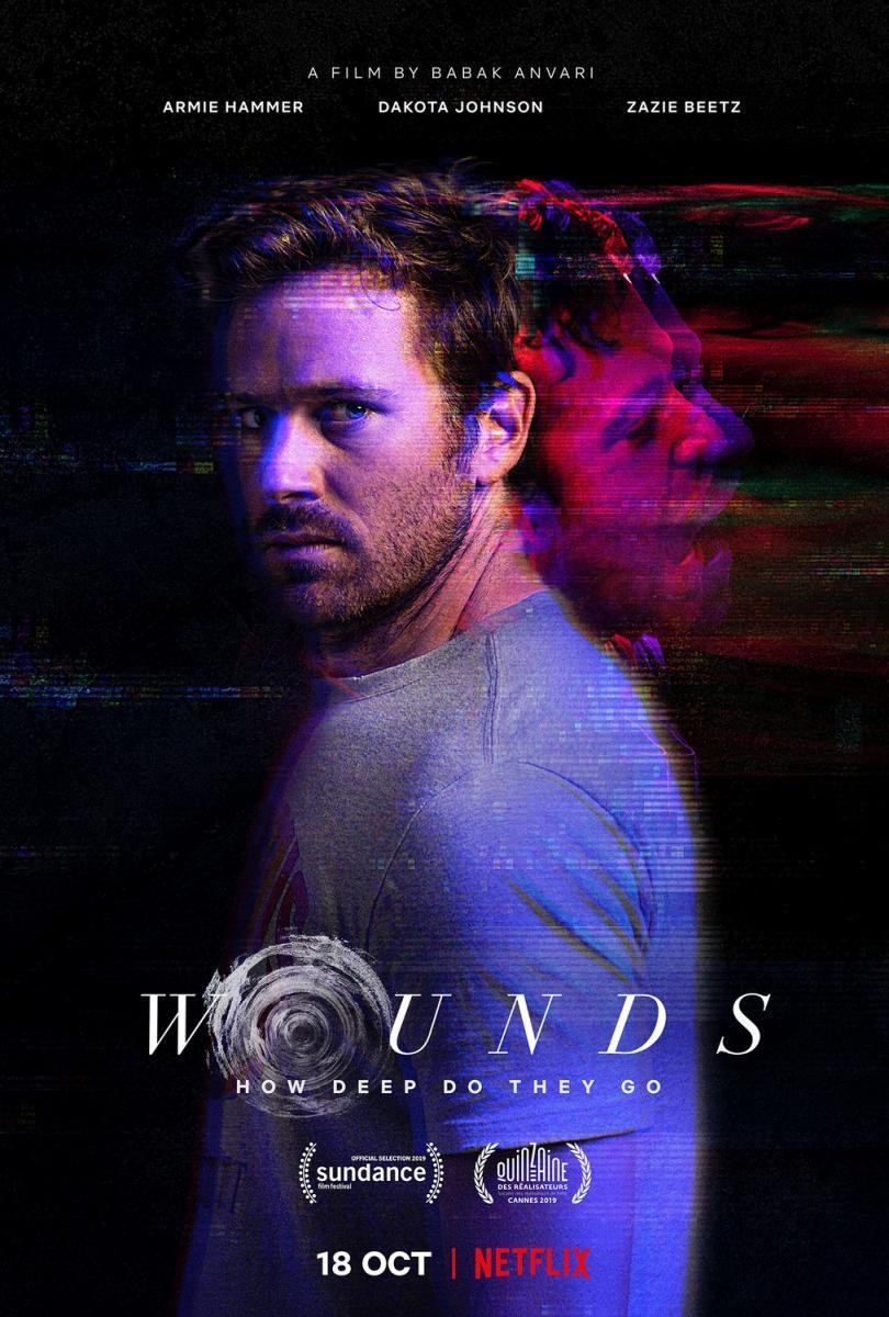 cartel de wounds con una foto de armie hammer y en su espalda Evil armie hammer con colores opuestos