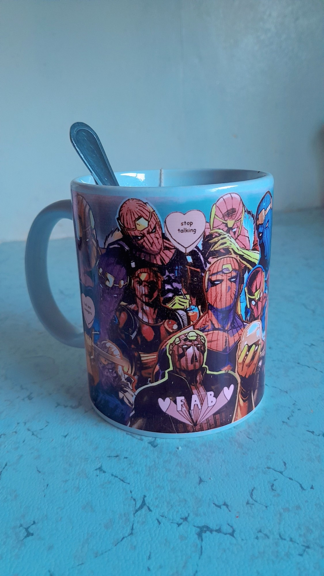 A picture of a mug with a collage of Baron Zemo comic panels.