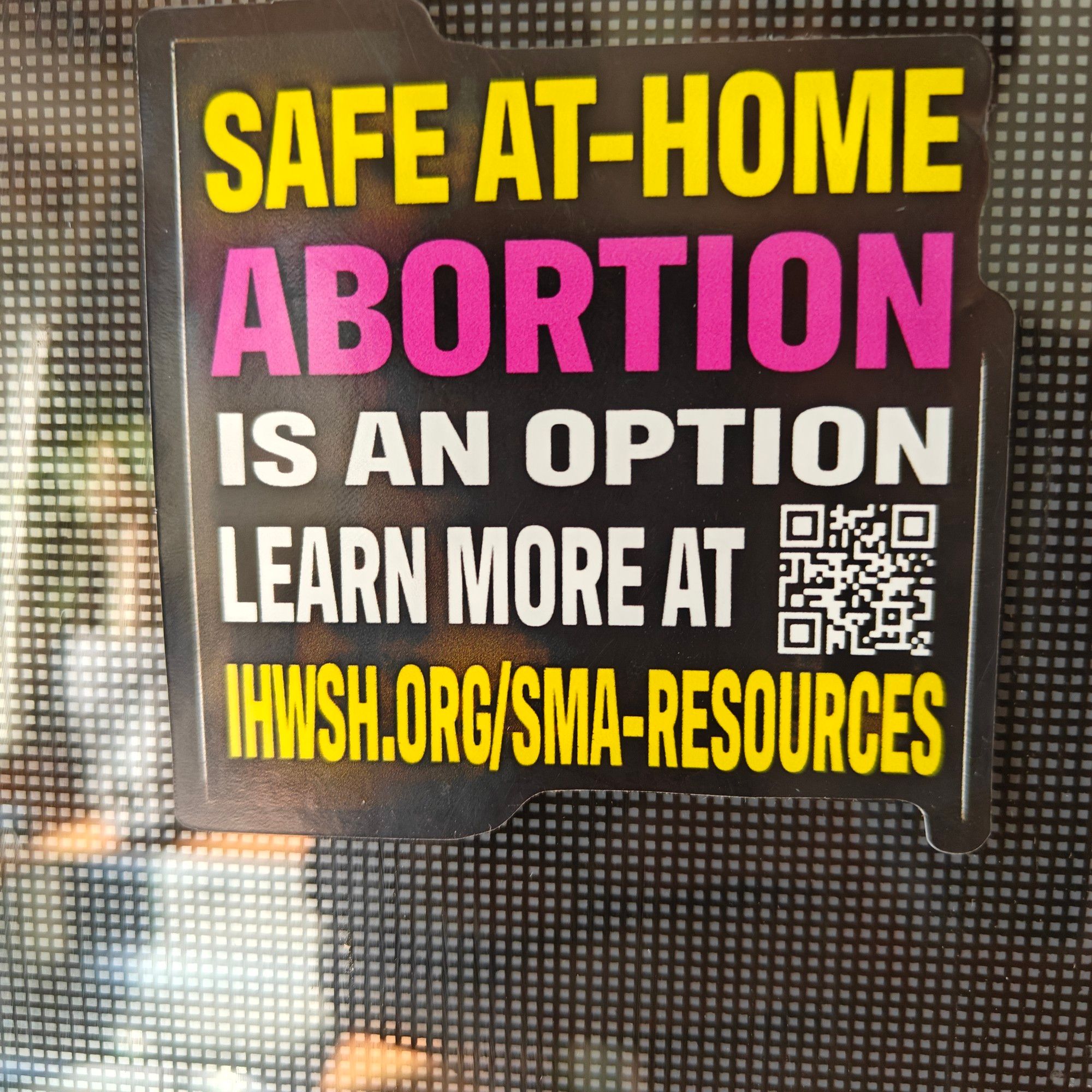 Zoom in on the sticker on the oven. It says safe at home abortion is an option learn more IHWSH.org/sma-resources