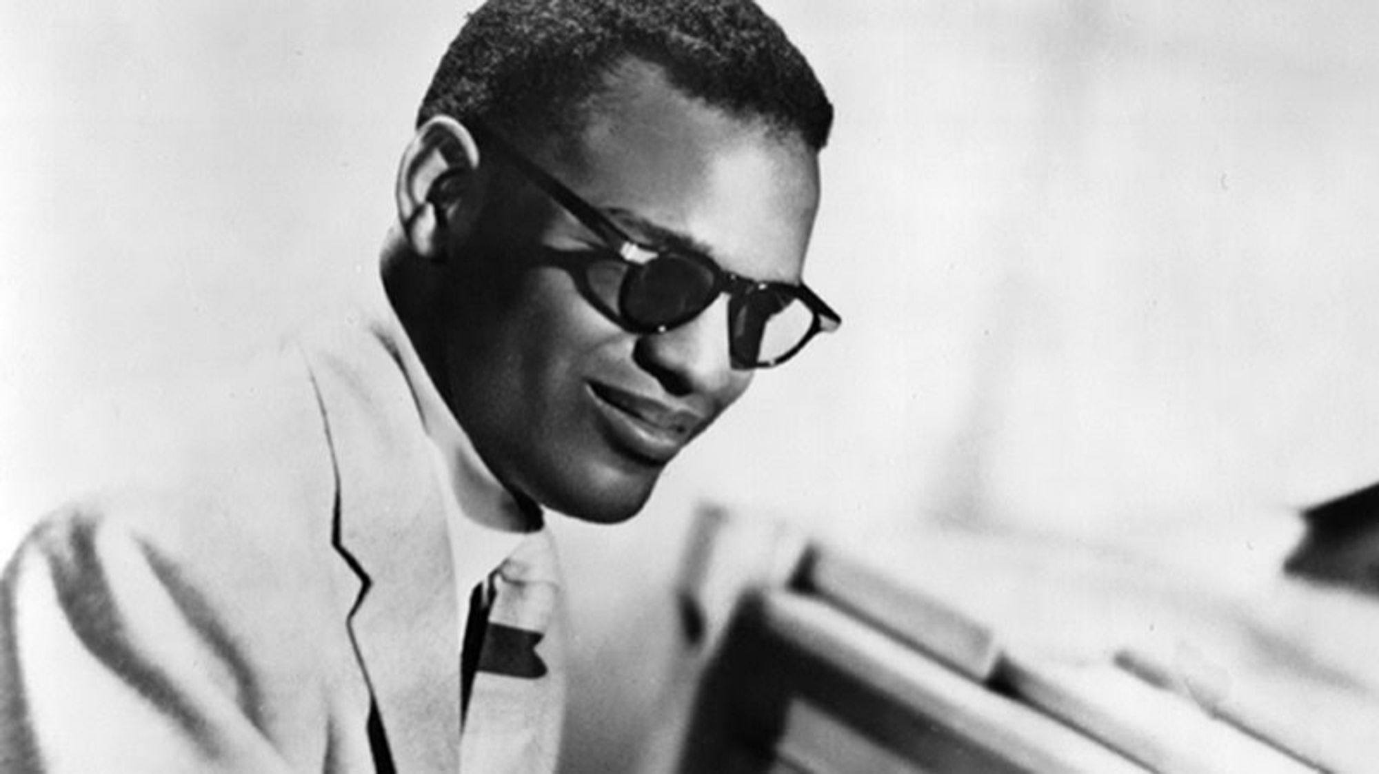 A photograph of musician and recording artist Ray Charles, who was visually impaired. The image is used as the punchline to jokes about one's willful ignorance.