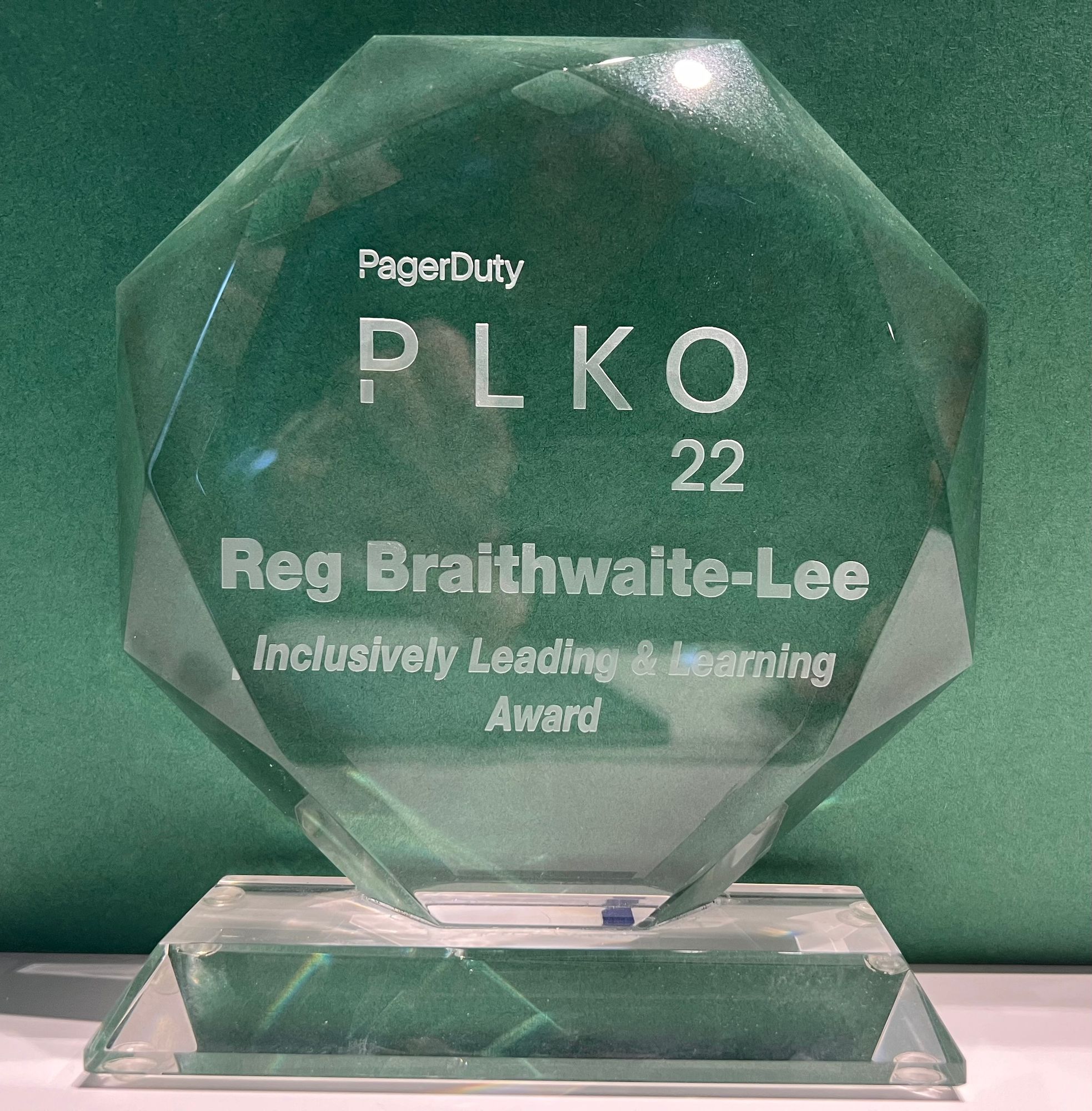 Lucite trophy reading:

PagerDuty PLKO 22

Reg Braithwaite-Lee
Inclusively Leading & Learning Award