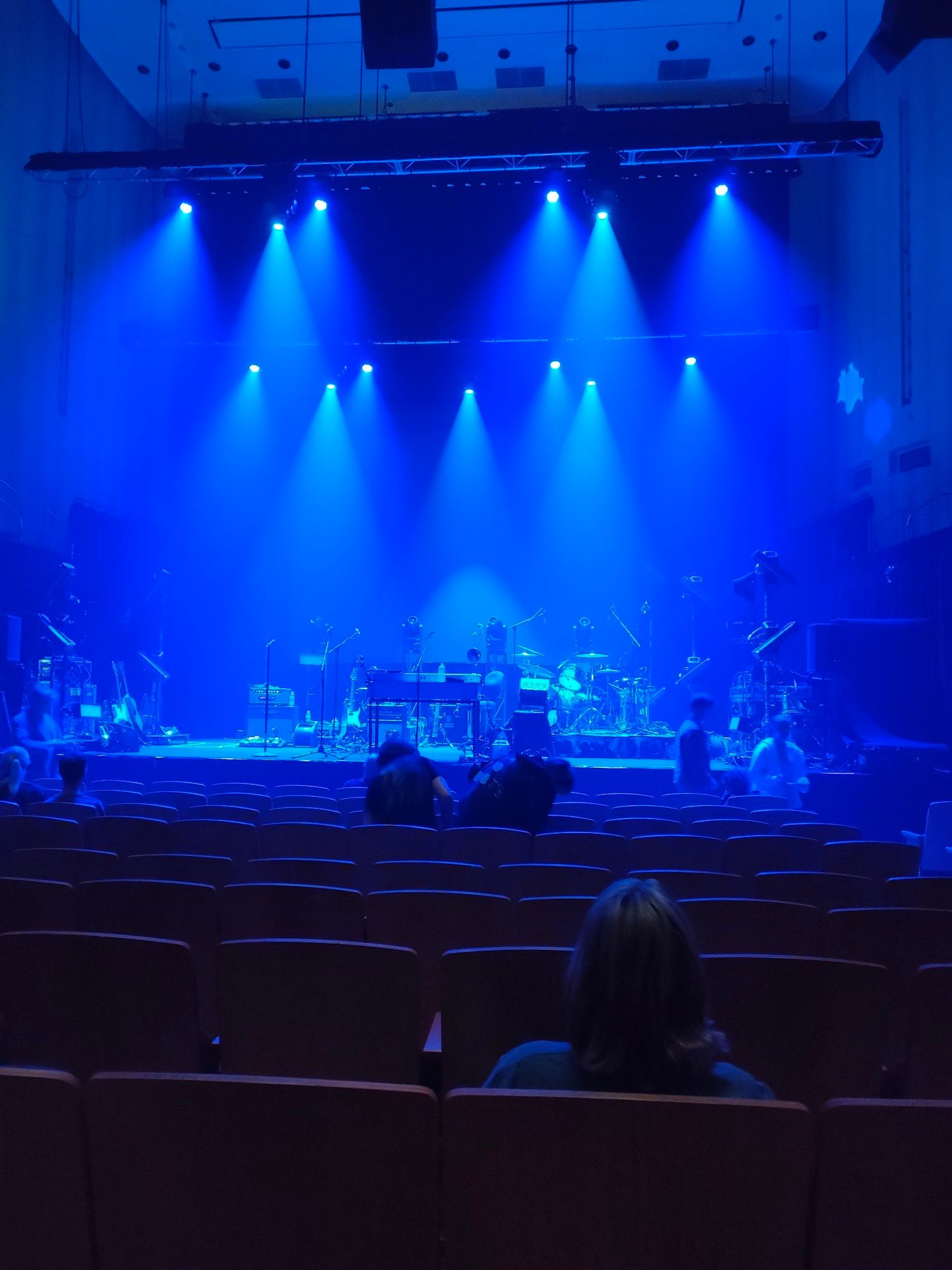 An empty stage waiting for They Might Be Giants to start. We're 10 rows back from the front (this is a seated venue, unlike last night when we were just behind the people at the very very front)