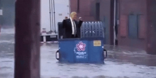 Trump in a dumpster floating down a flooded street