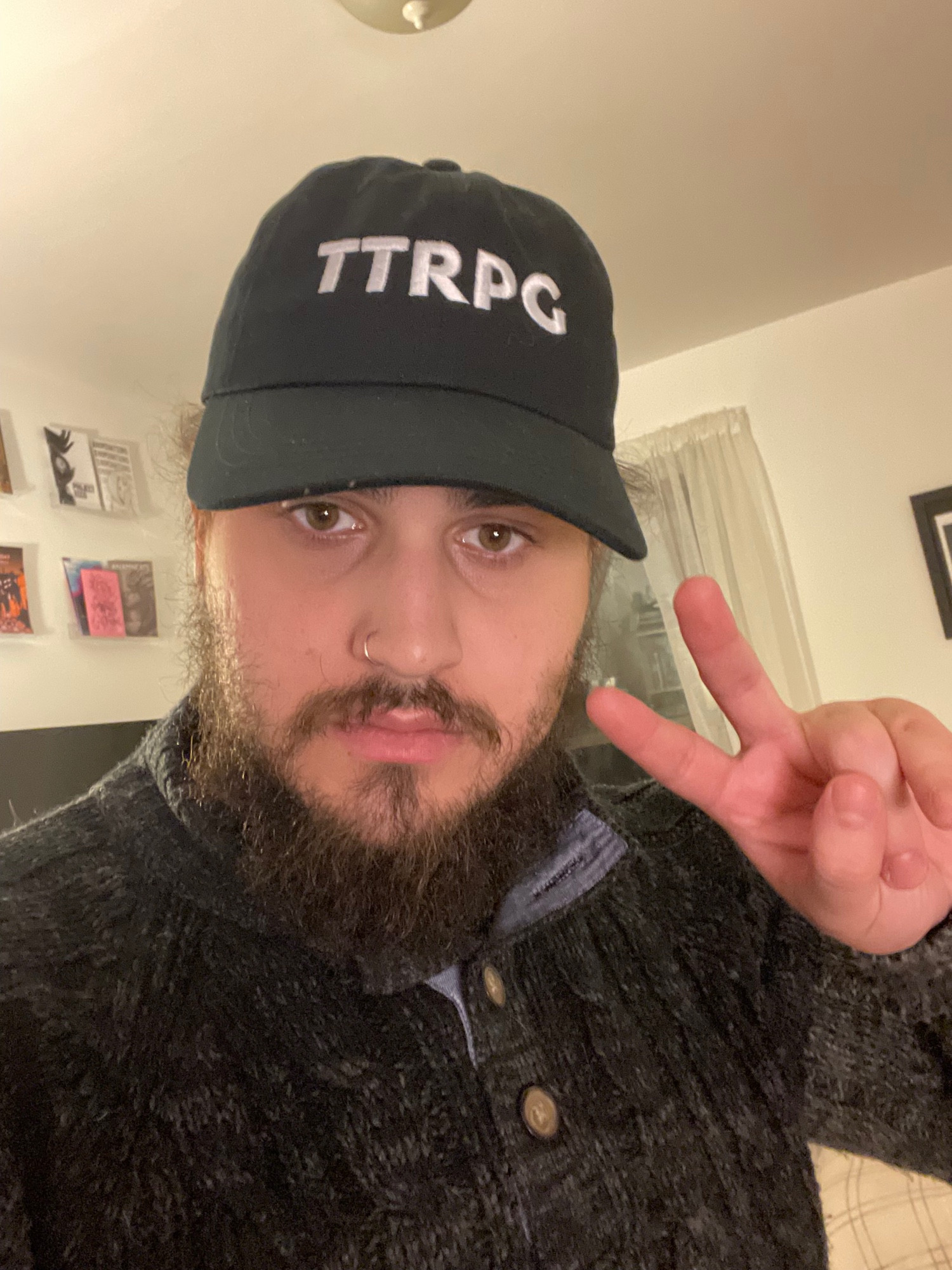 Elliot selfie rocking his new TTRPG embroidered hat