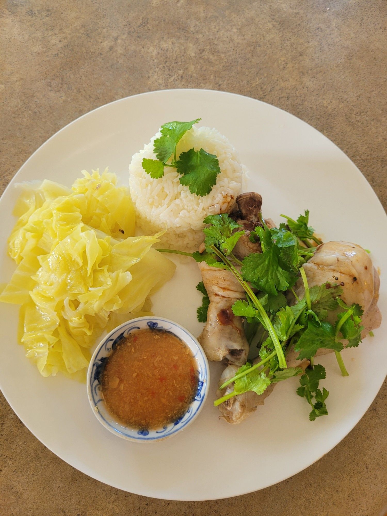 Dinner as described served on a round white plate.