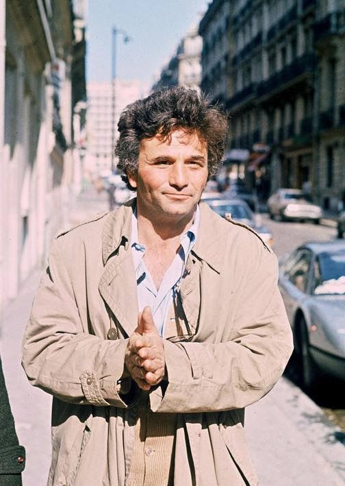 Peter Falk in semi-columbo mode wearing a trench coat but his tie is missing and, of course, obligatory: his shirt is half undone. He rubs his hands together because it's either cold, or he sees a bowl of chili just behind the cameraman