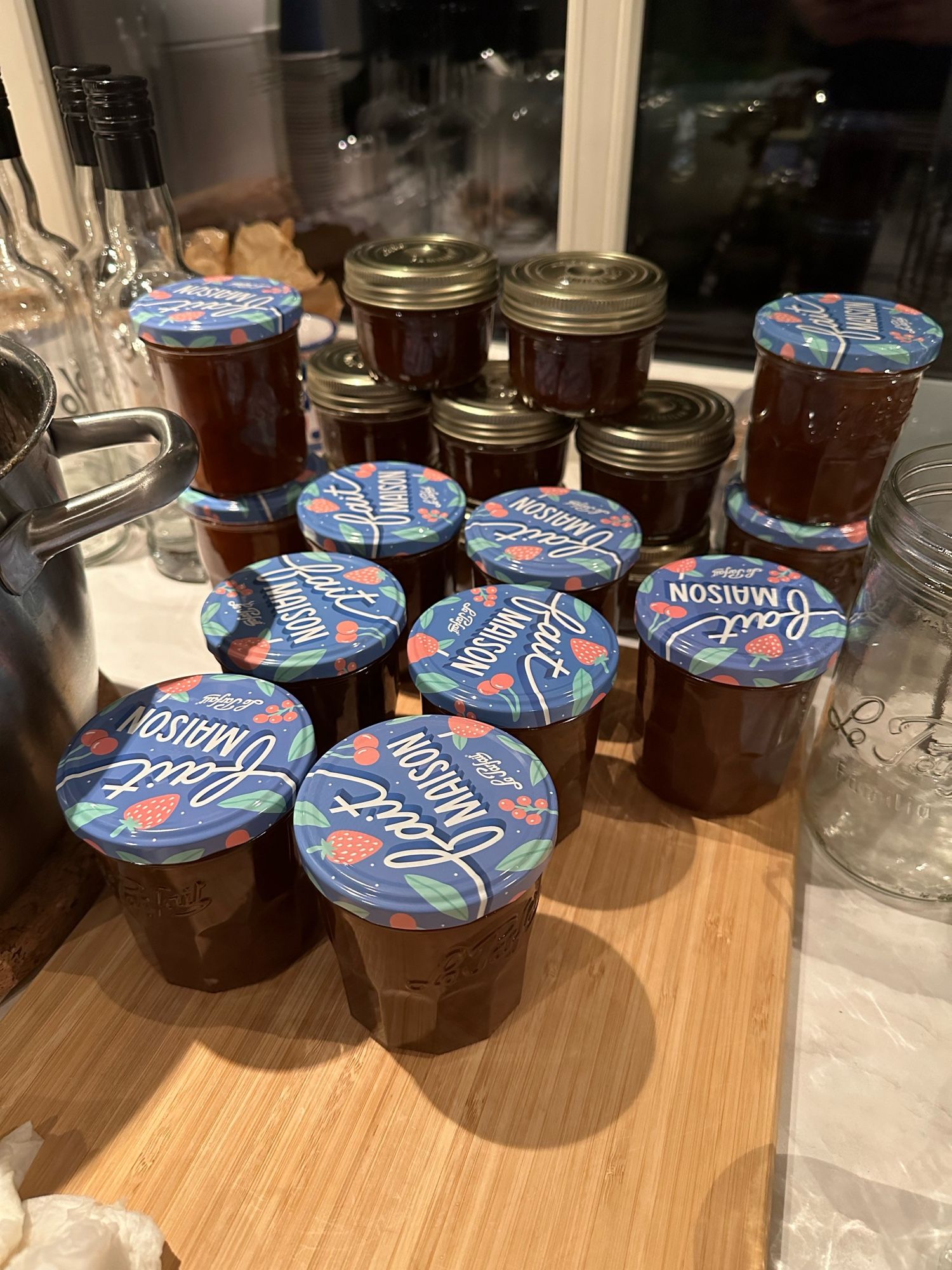 Many jars of green plum jam.