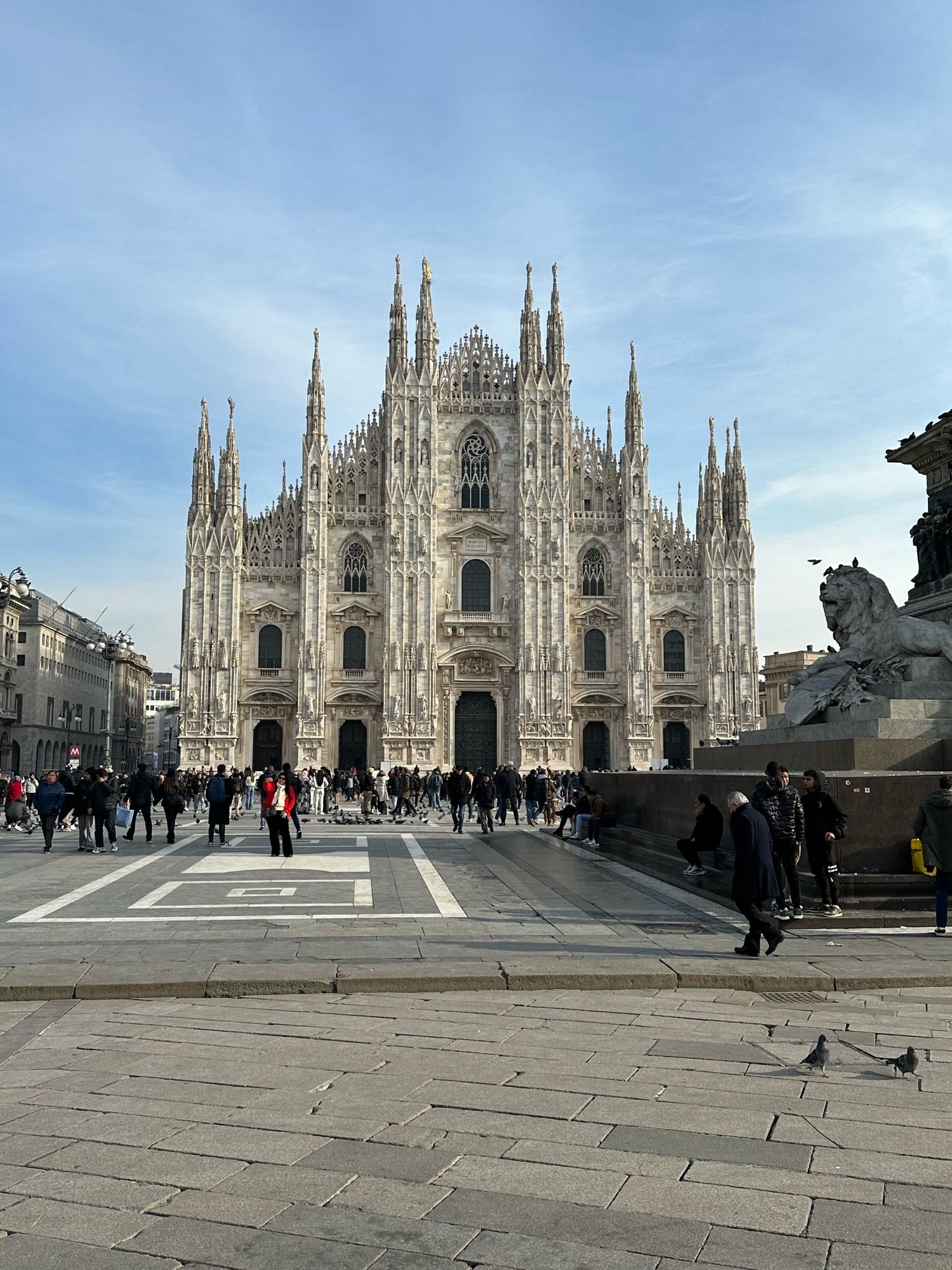 Big cathedral. It is named Duomo Di Milano. Such pointy. Do not sit on it.