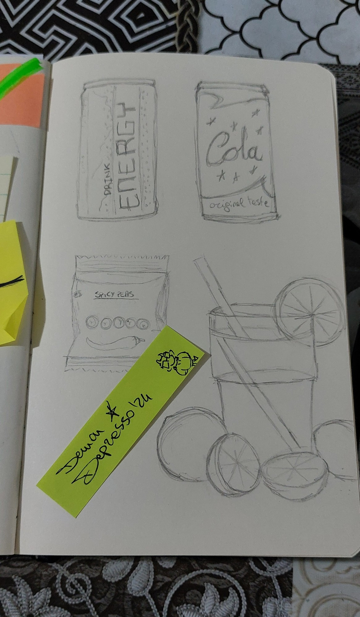 Photo of a off-white sketchbook page. There are pencil sketches/studies of cans of generic brand drinks (an energy drink and a cola), of a packet of spicy peas and of a glass of lemonade with lemons around it. There's a thin green sticky note with my sona doodled on a corner and my signature "Demon Depresso '24" written on it.