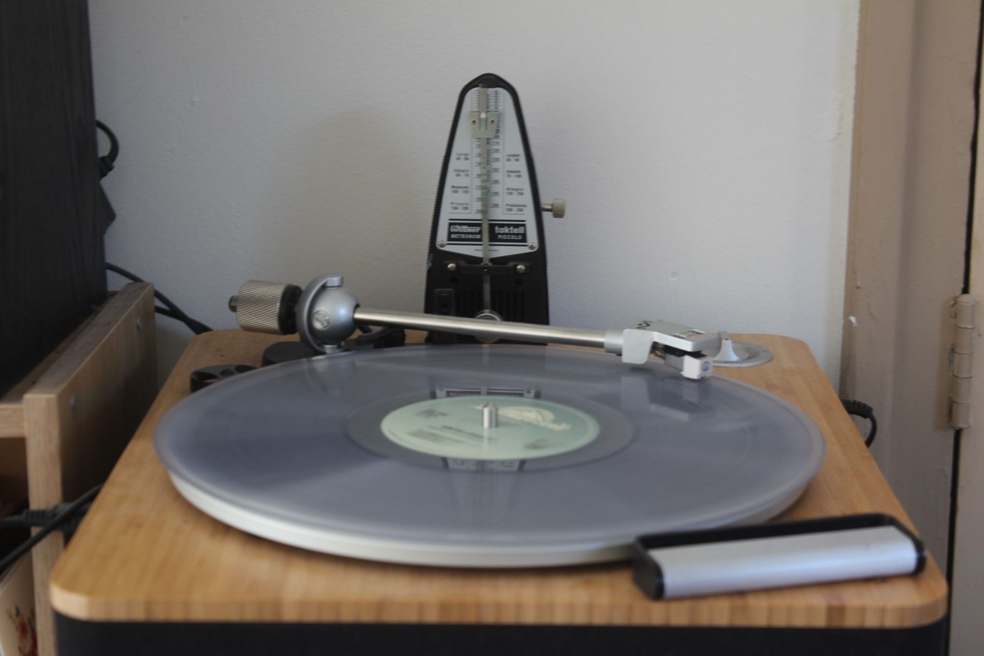 A record player and a metronome.