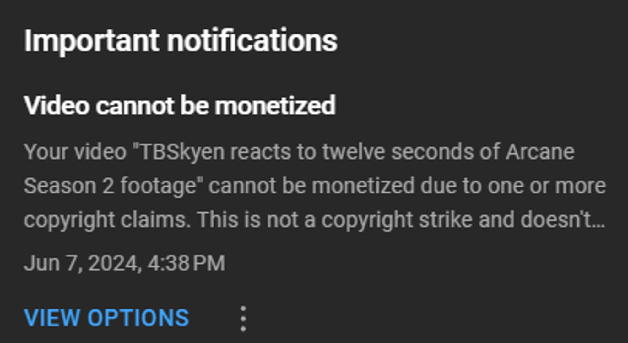 Youtube notification reading: "Your video "TBSkyen reacts to twelve seconds of Arcane Season 2 footage" cannot be monetized due to one or more copyright claims. This is not a copyright strike and doesn't..." with a button to review options.